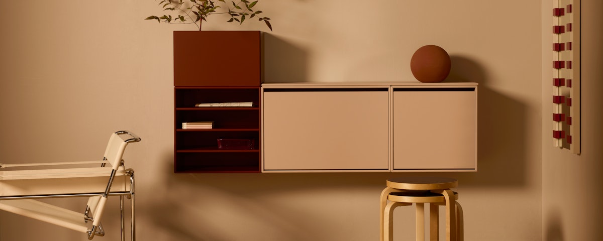 Montana Furniture Entry Console on an entryway wall with stools below it