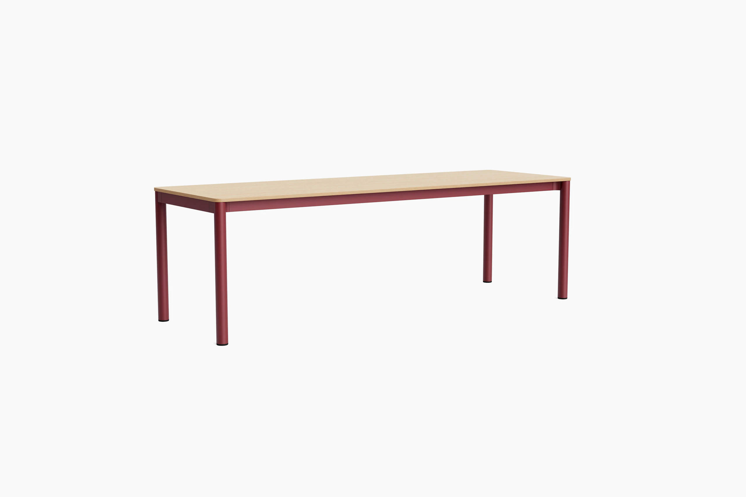 Annex flush table with red legs and light wood top, angled from front left.