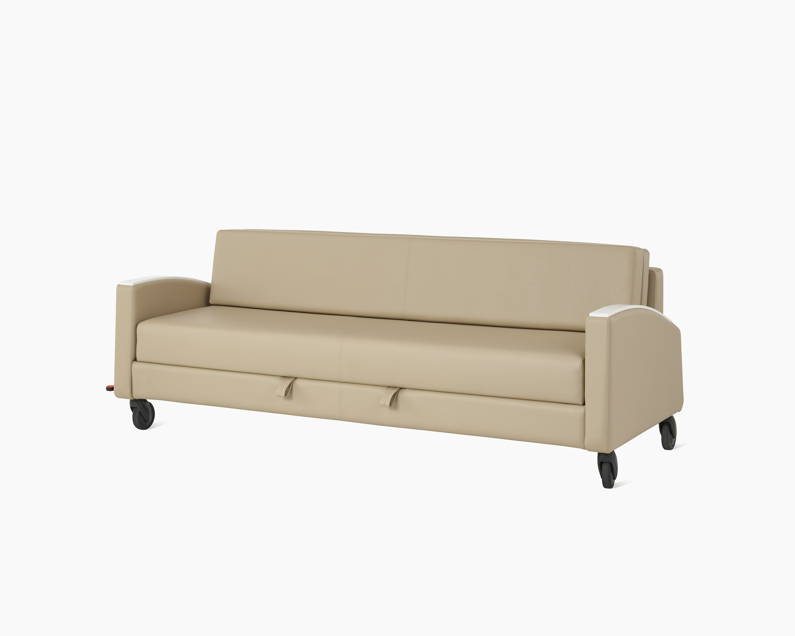 Gemma Double Sleep Sofa with central brake and steer casters and curved armrests. Viewed at an angle.