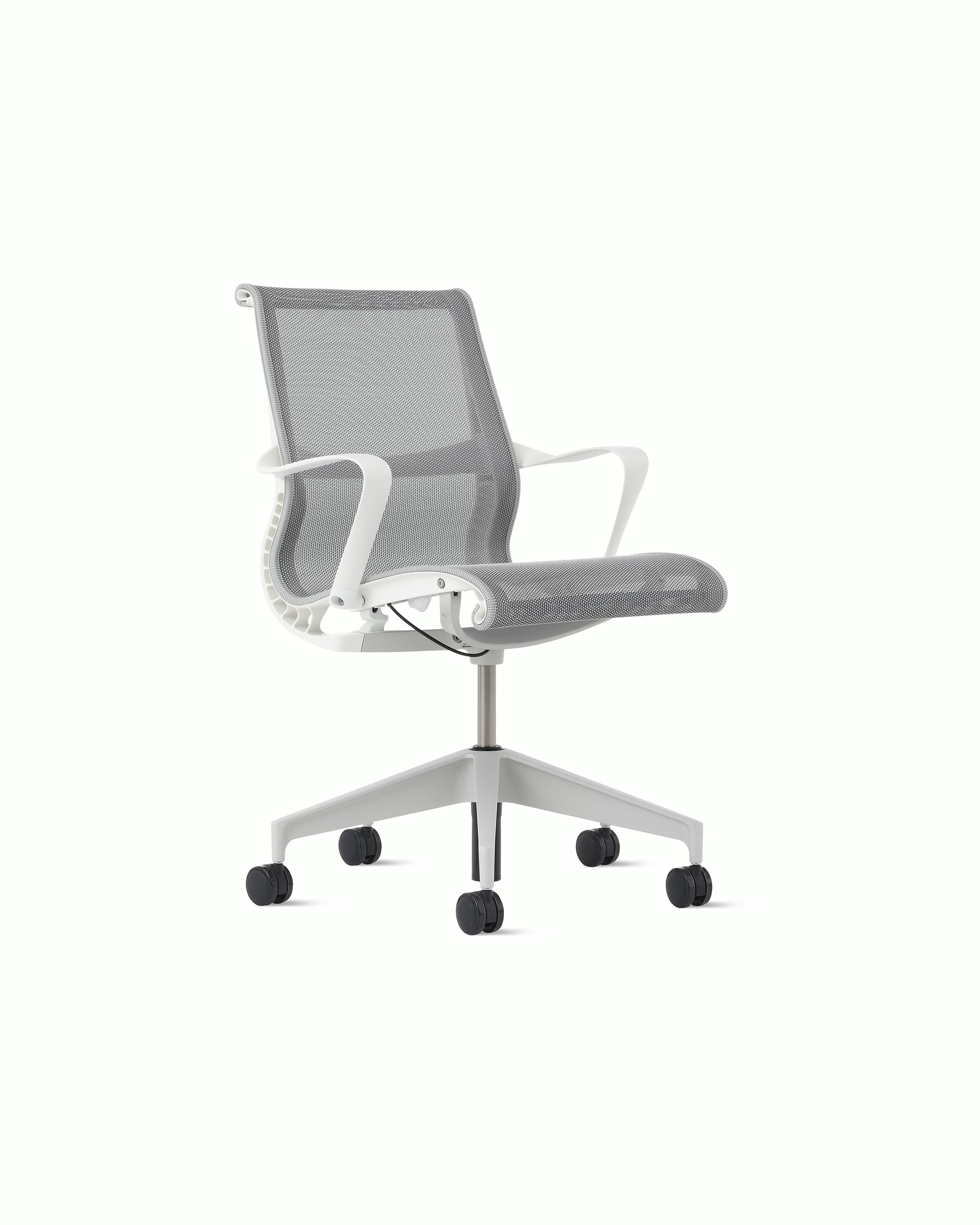 Front angle view of a Setu chair with grey suspension, white frame and silver alloy base.