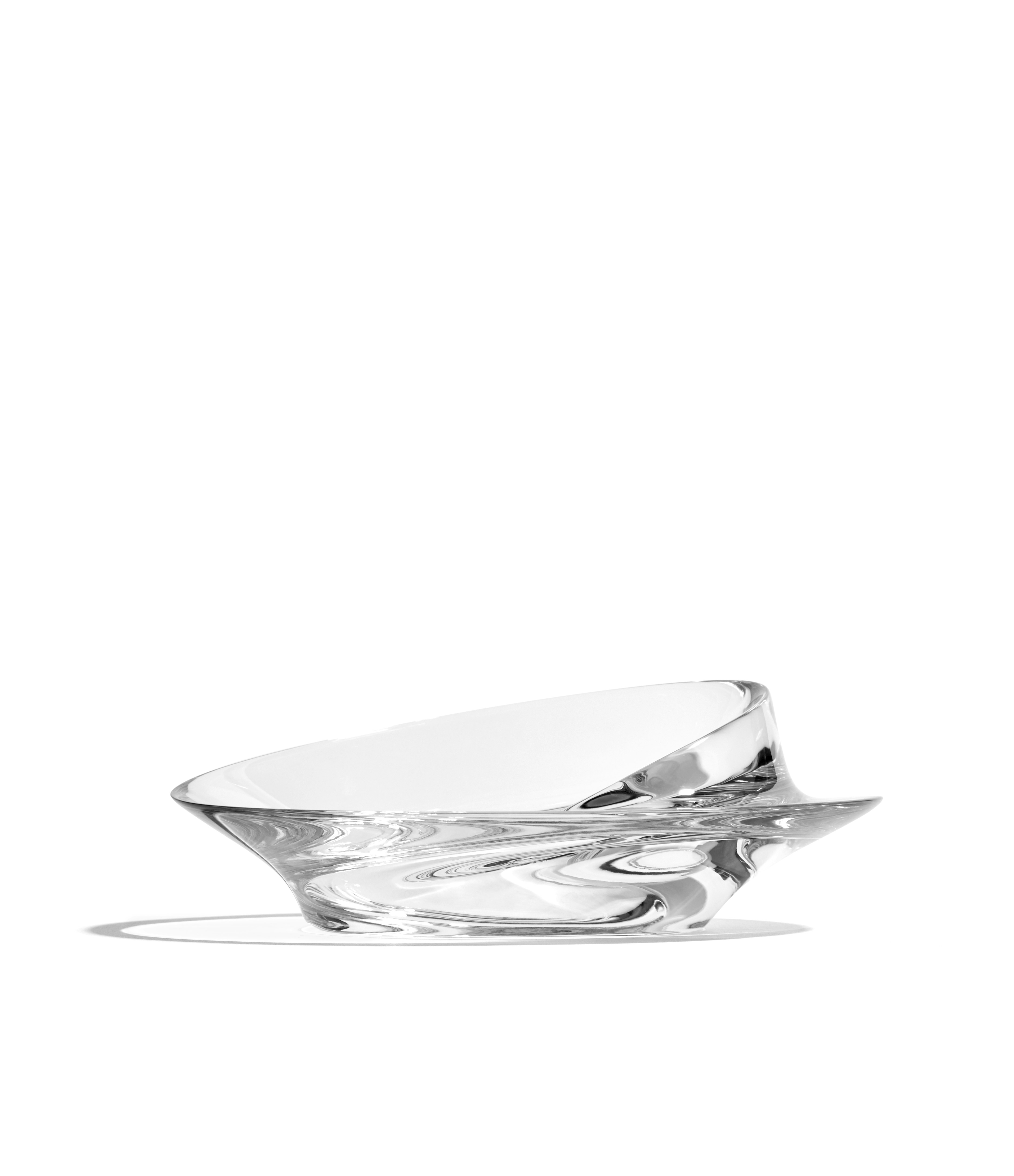 A Swirl Bowl in Small, Glass viewed from the side.