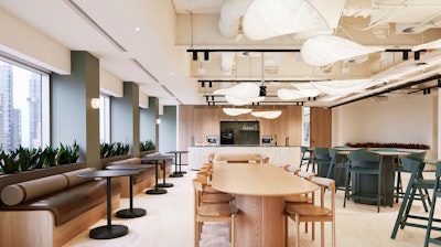 Large café space with a mix of tables with Cover Stools and Comma Chairs.