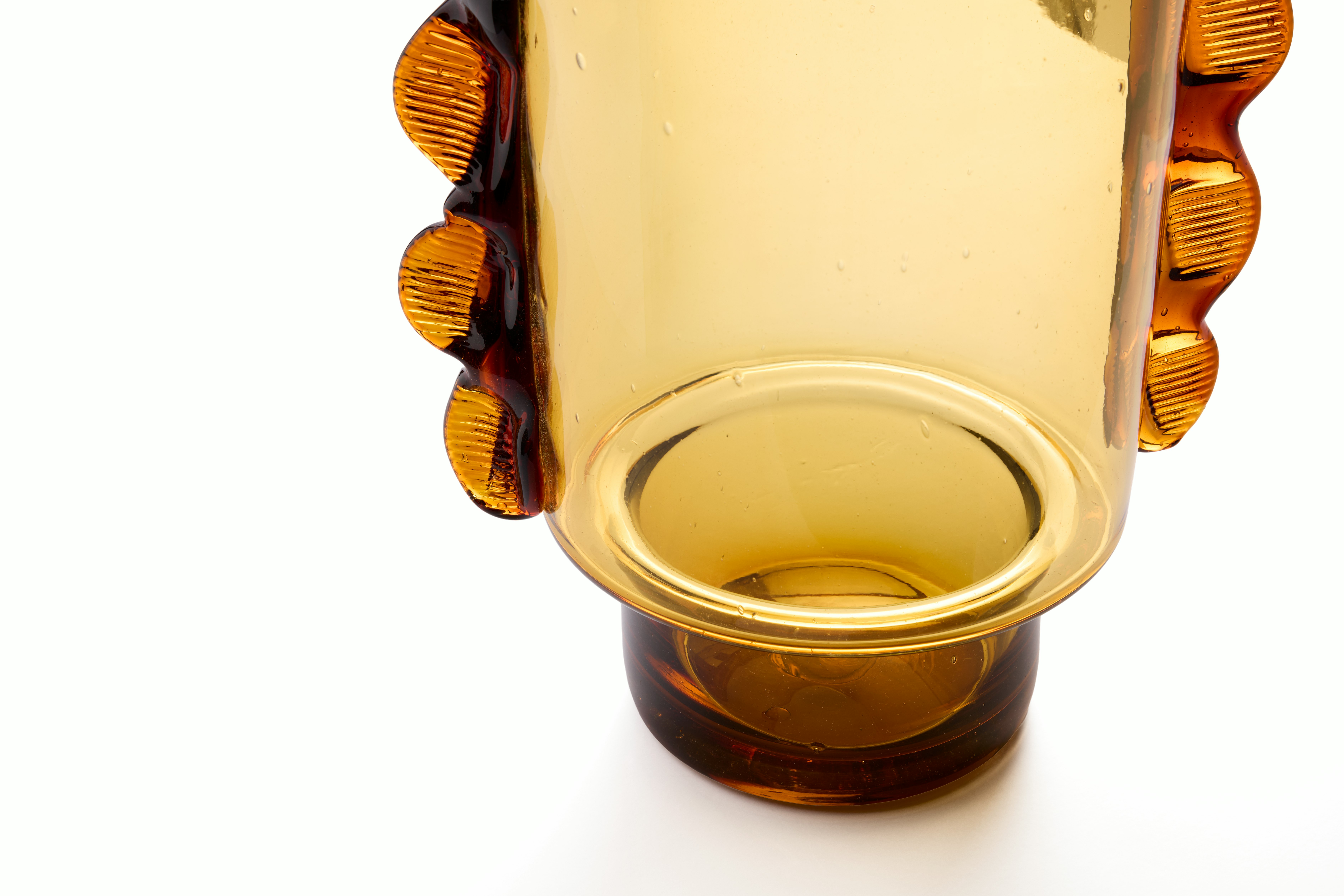 A detailed look at a Nora Vessel in Amber.