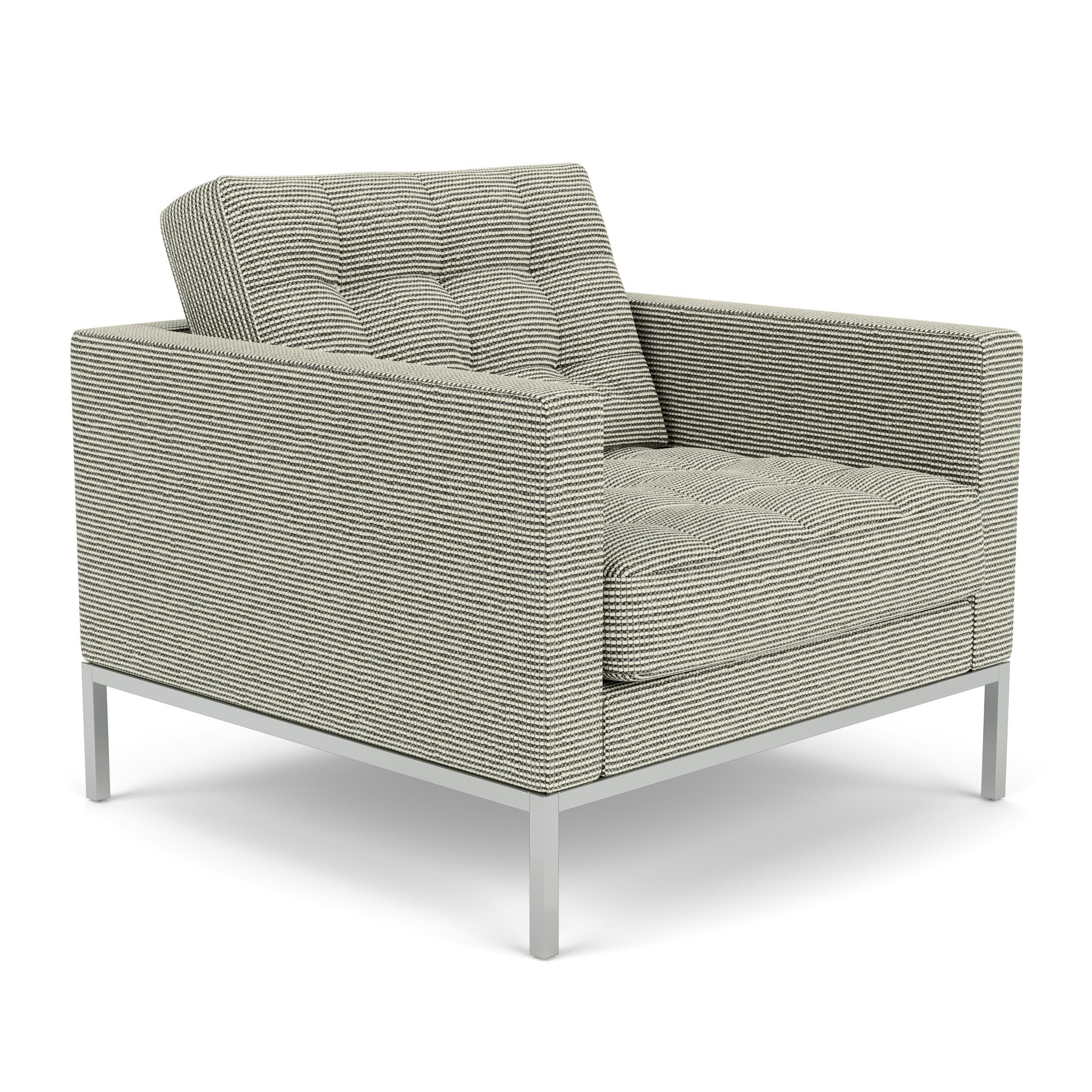 A Florence Knoll Relaxed Lounge Chair in Vanilla with Chrome viewed from an angle.