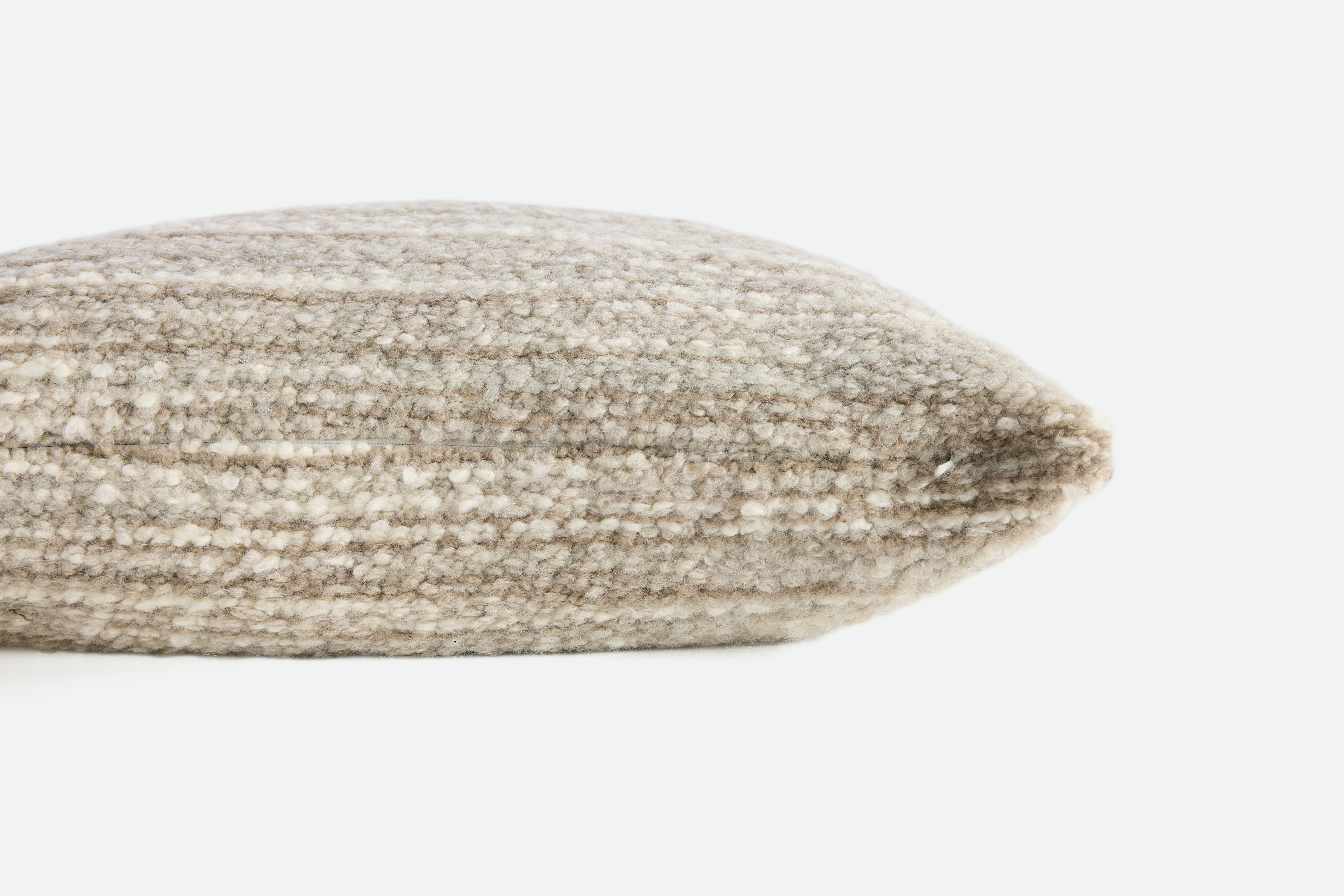 A detailed look at a Holly Hunt Winnie Pillow in Natural.