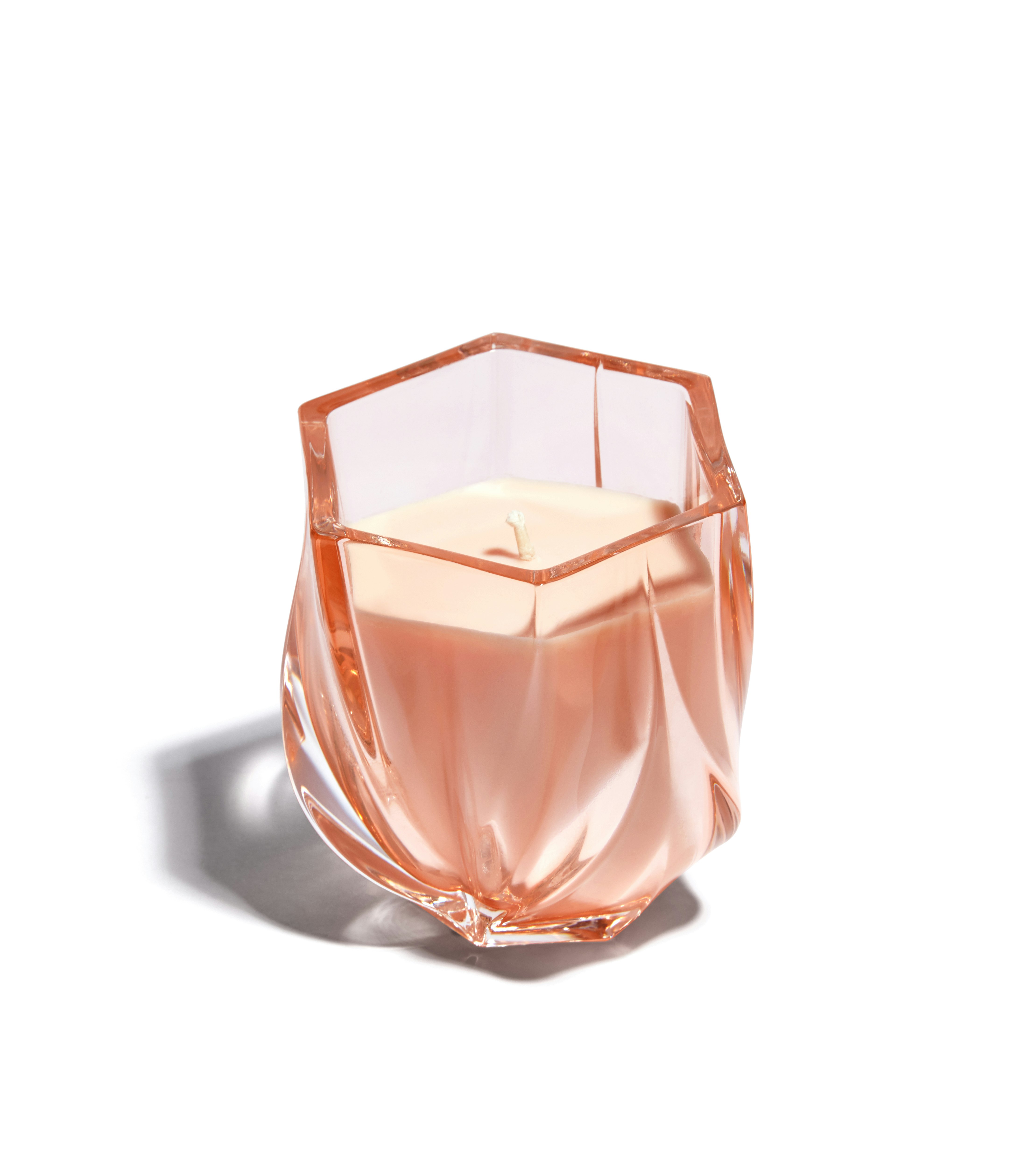 A Shimmer Scented Candle in Rose viewed from the front.