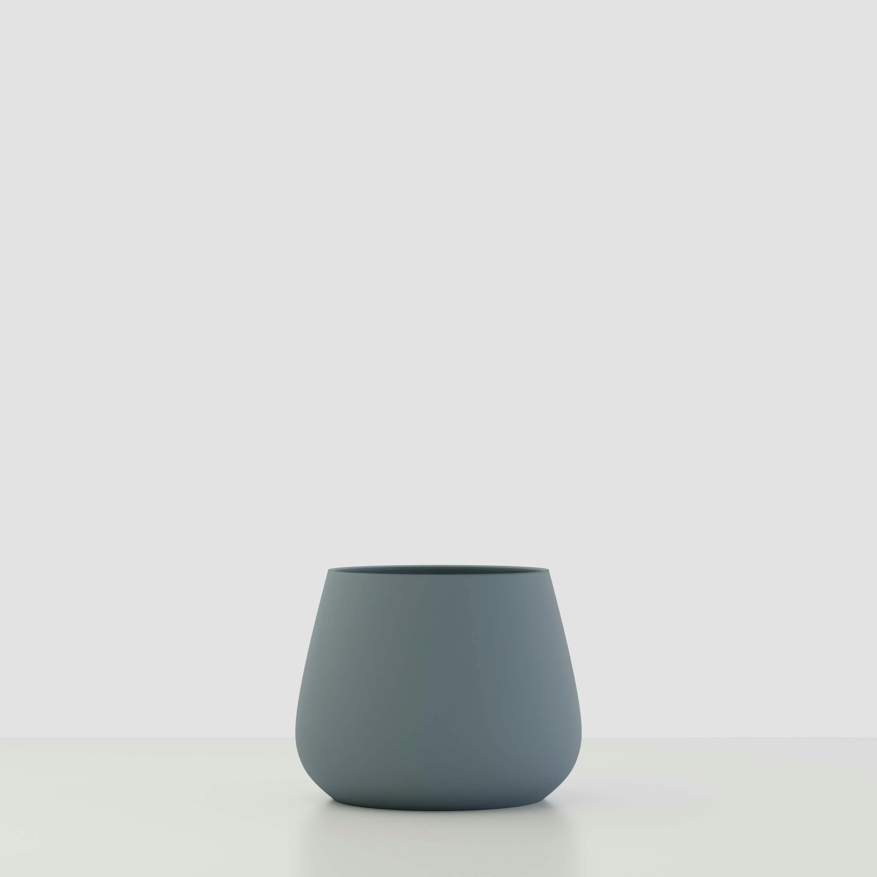 A Sausalito Concrete Planter in Seafoam Slate Viewed from the front.