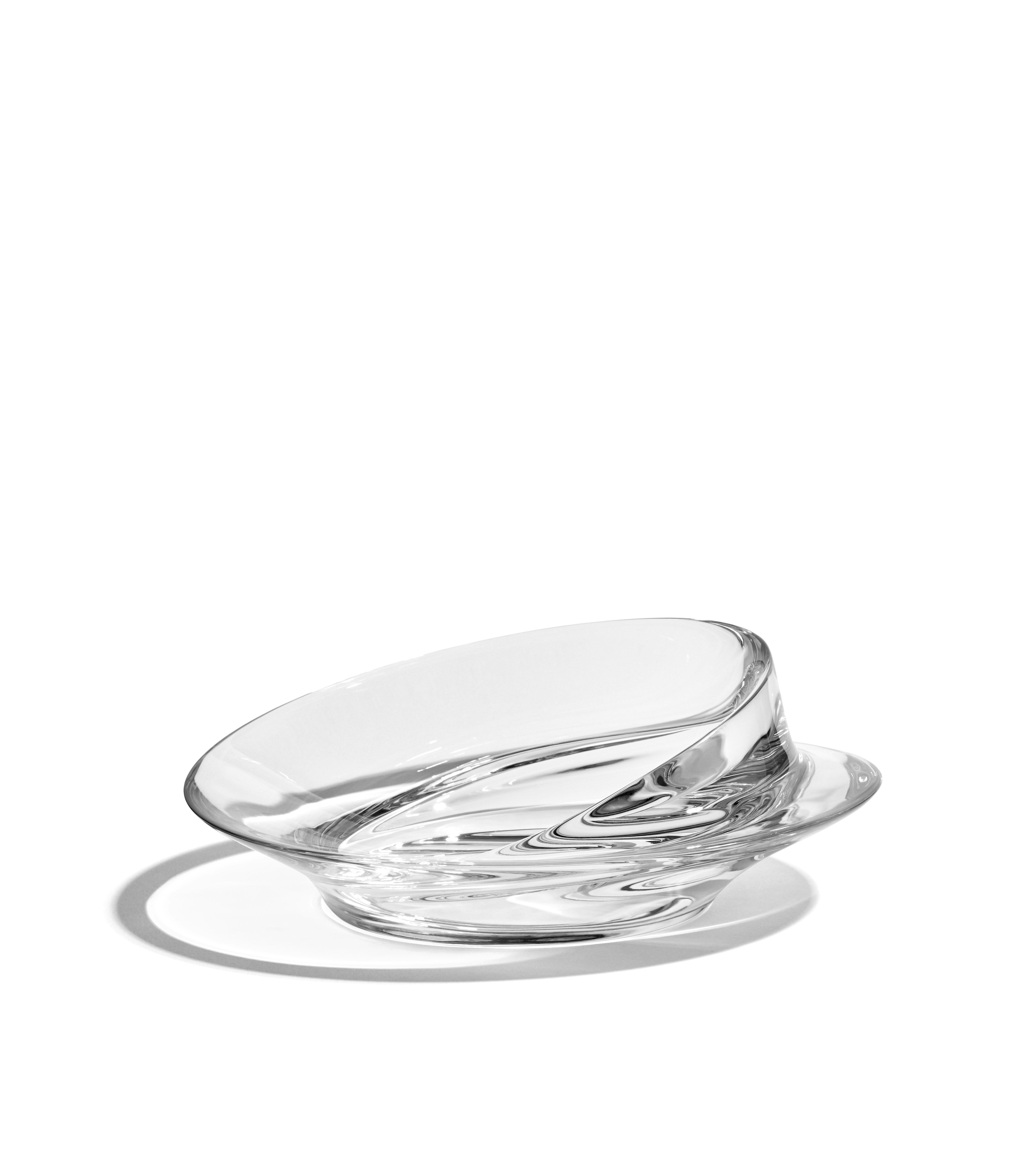 A Swirl Bowl in Small, Glass viewed from an angle.