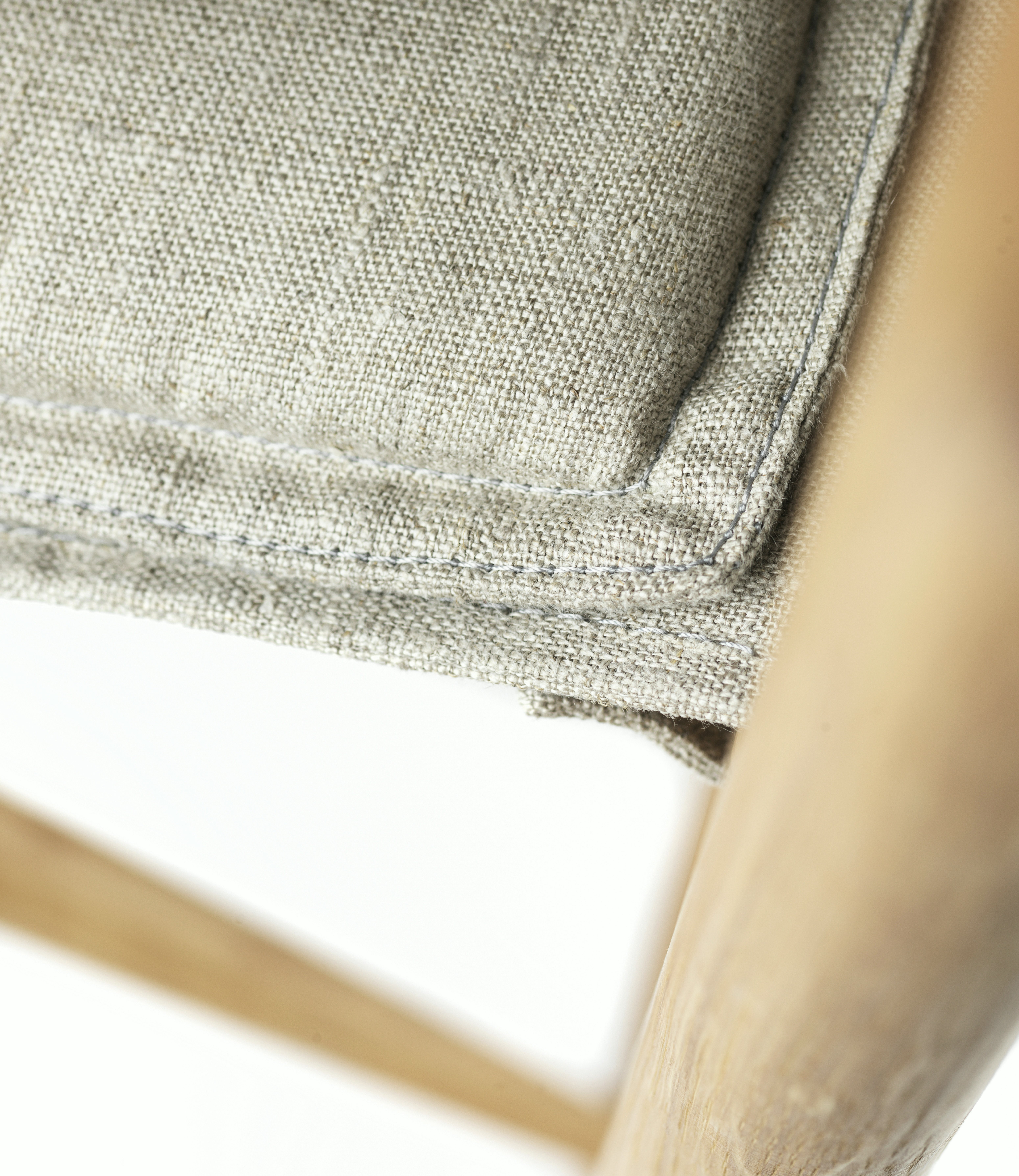 A detailed look at a J138 Folding Chair in Oiled Oak.