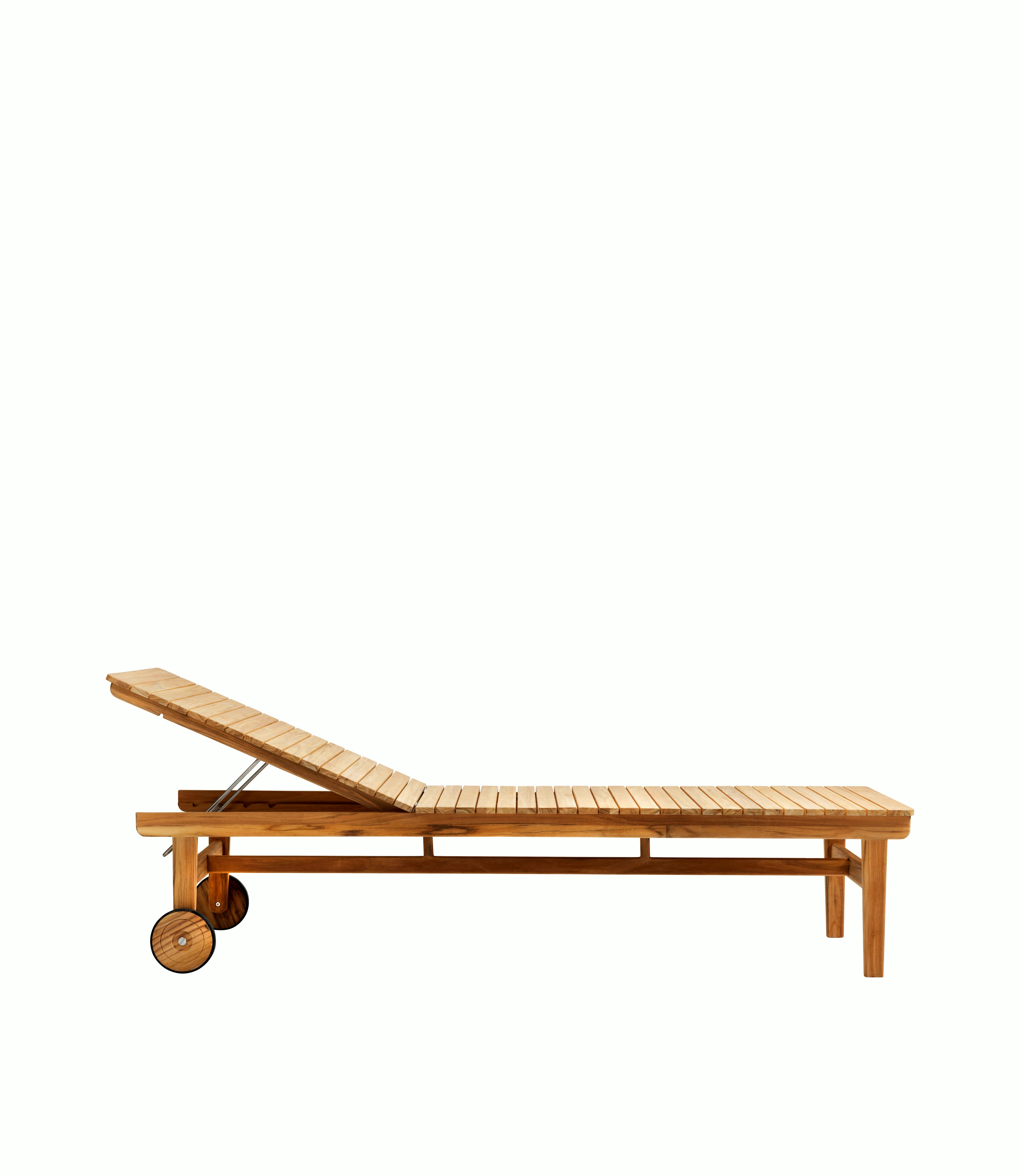 A Sammen Outdoor Bench in Sammen Outdoor Chaise - Natural Teak viewed from the side.