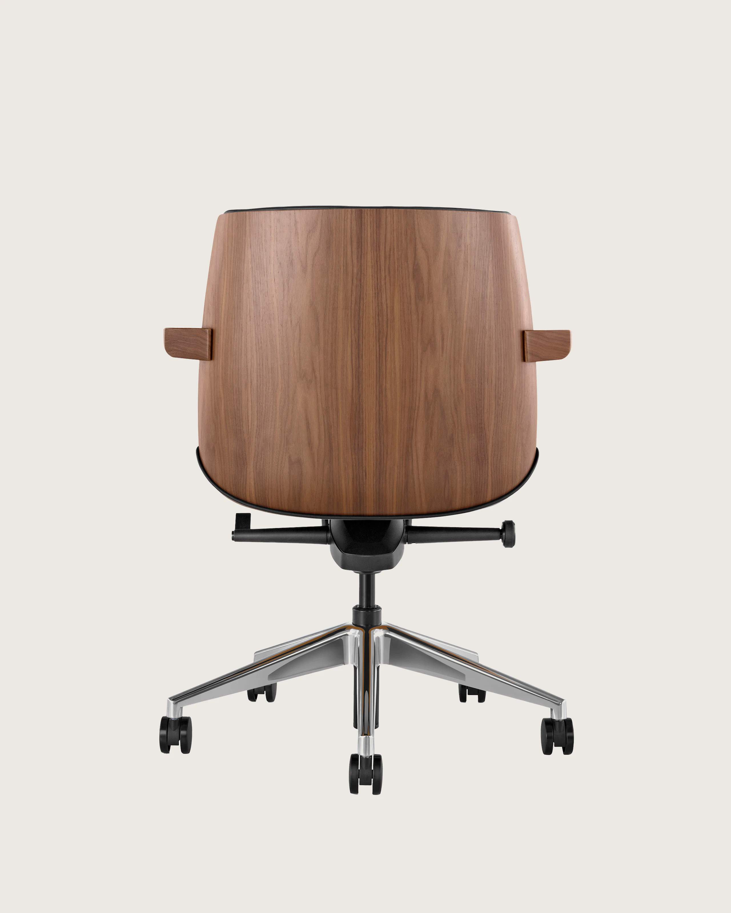 Back view of a low-back Clamshell Conference Chair with black leather upholstery, a walnut shell, with arms.