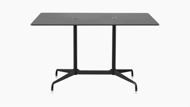 A rectangle Eames Standing Height Table in black with two round cutouts on top and a segmented black base.