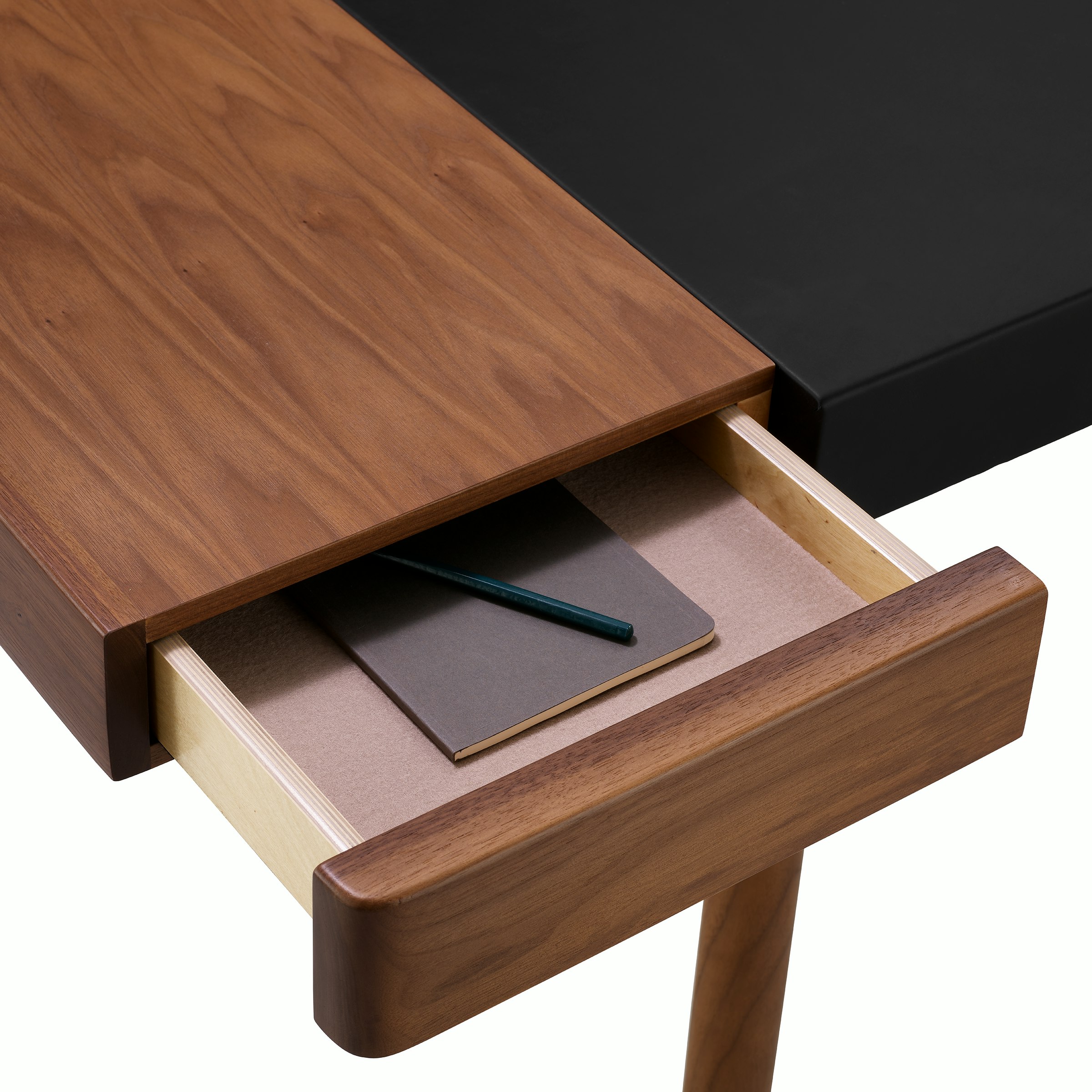 New Canaan Leatherwrap Sit-to-Stand Desk in Walnut and Black Leather, open drawer detail with notebook.