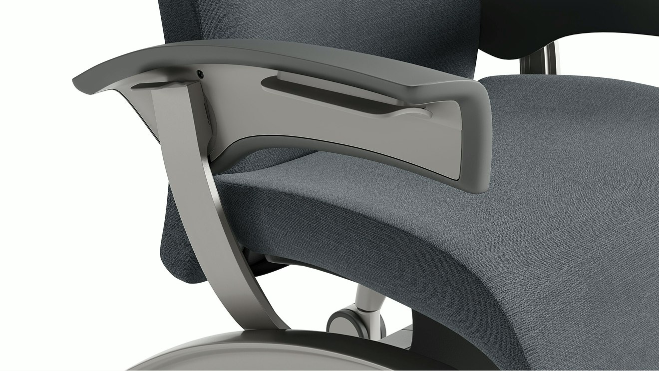 A close-up of the grey blue arm handle of a Herman Miller Nemschoff Nala Patient Chair