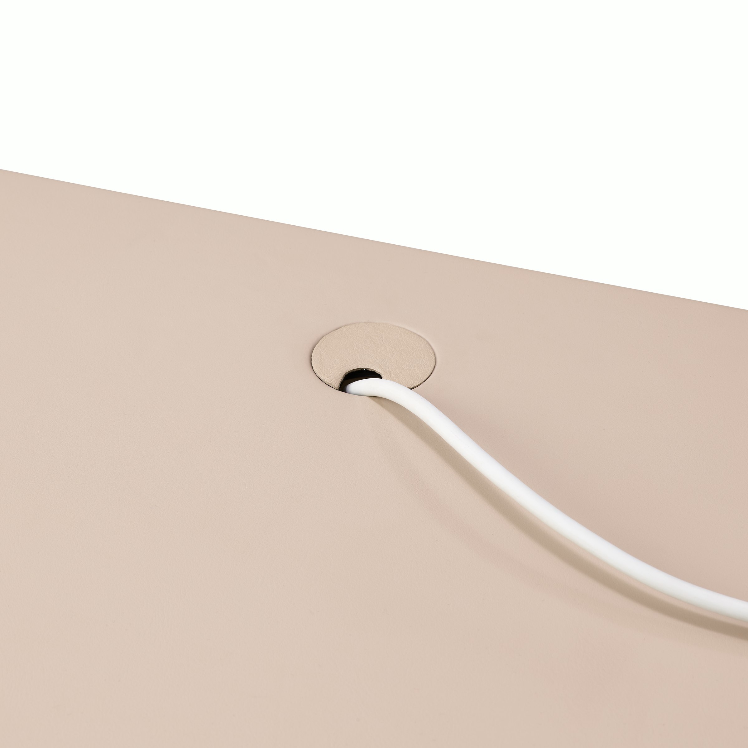 New Canaan Leatherwrap Sit-to-Stand Desk, Leather Wrapped Grommet Detail.