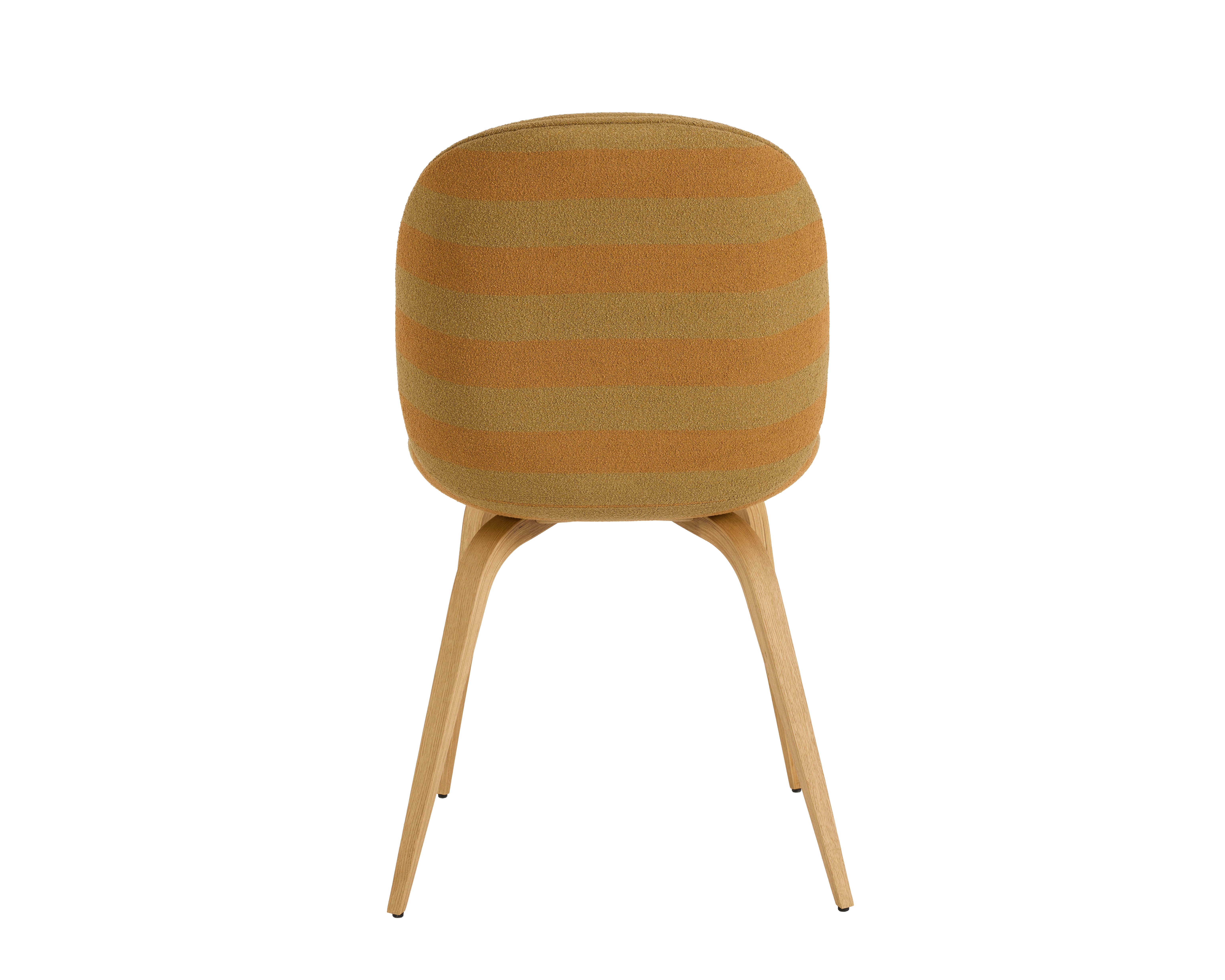 A Beetle Side Chair in sienna sand viewed from behind.
