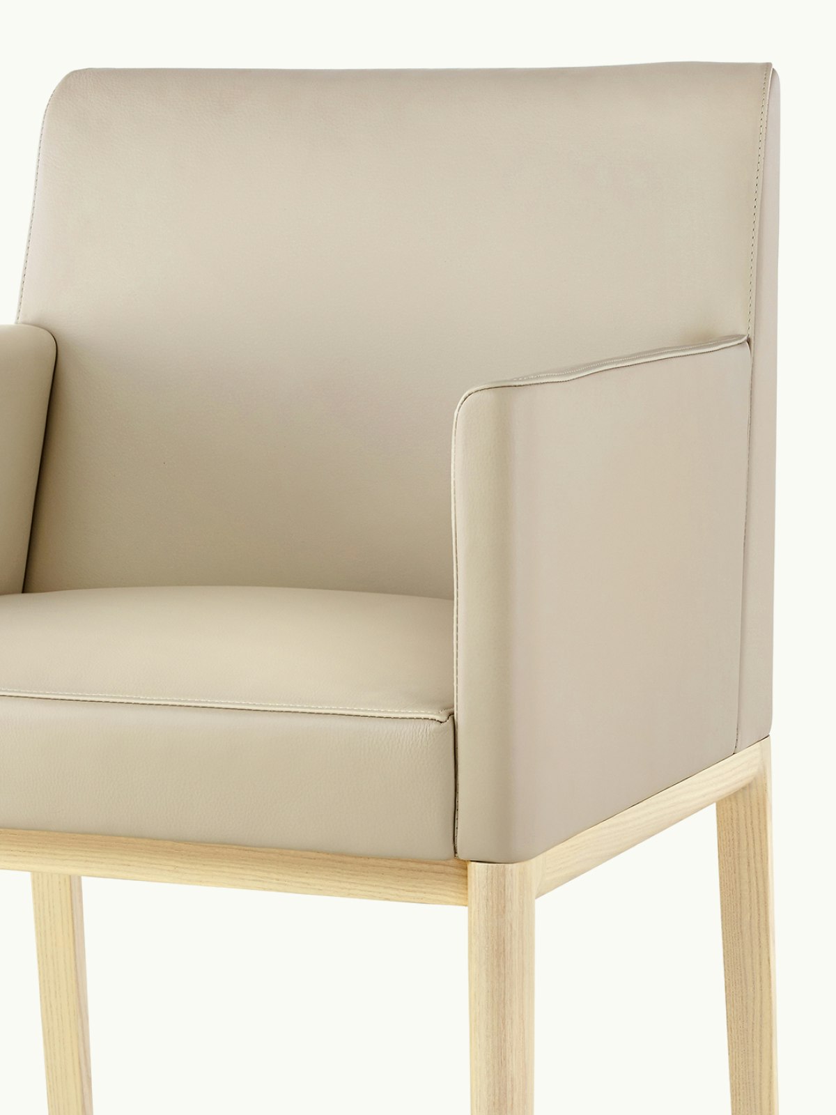 Close-up view of a Nessel Armchair.