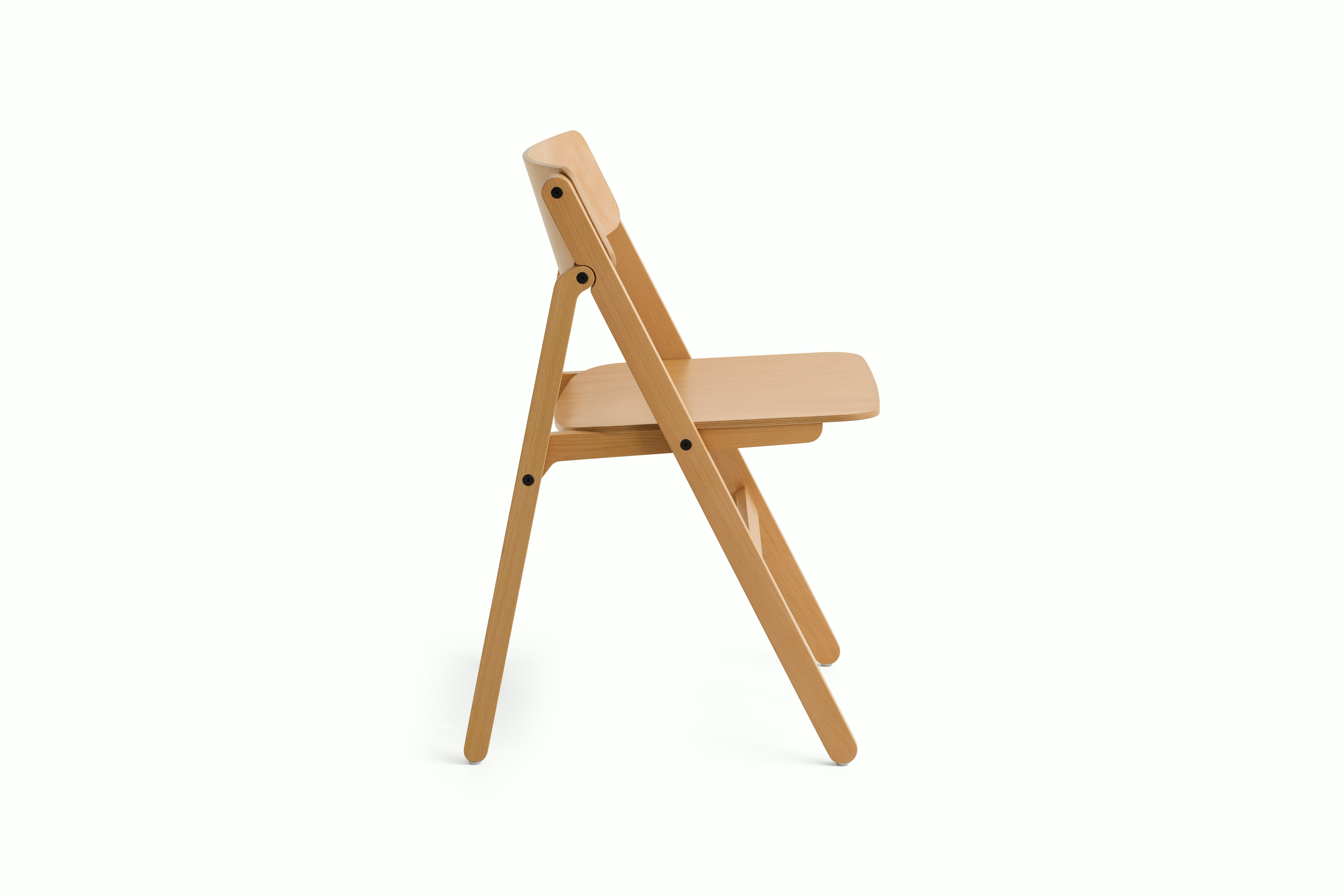 Backflip folding chair in golden finish, angled