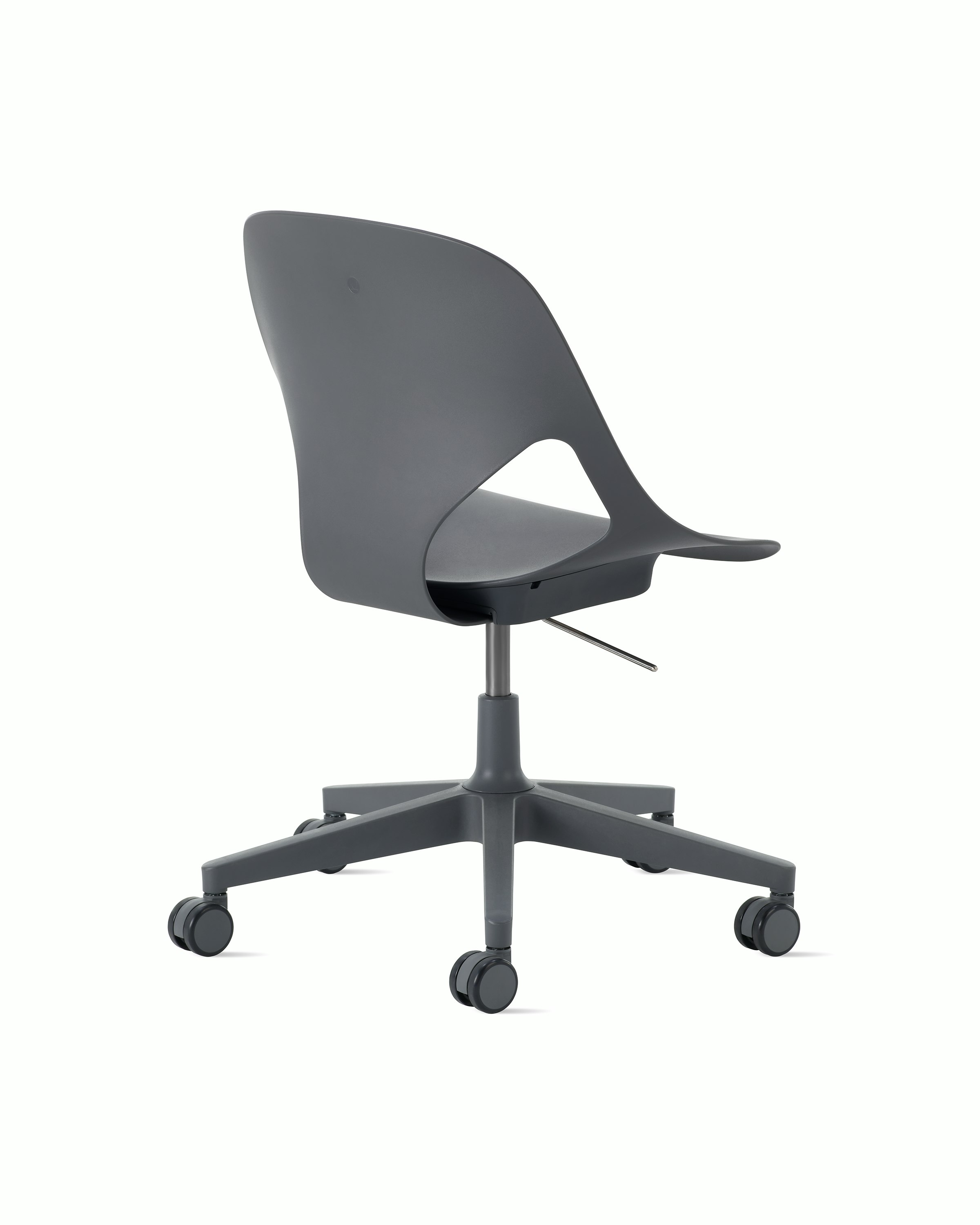 Rear angle view of a dark grey armless Zeph chair.