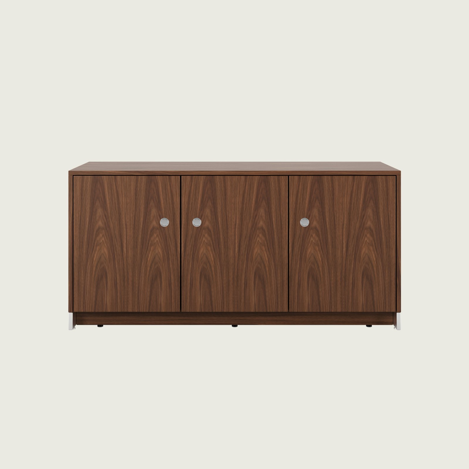 52.5 inch wide Sled Base Credenza with shelf storage in walnut with a chrome base and pulls viewed from the front.