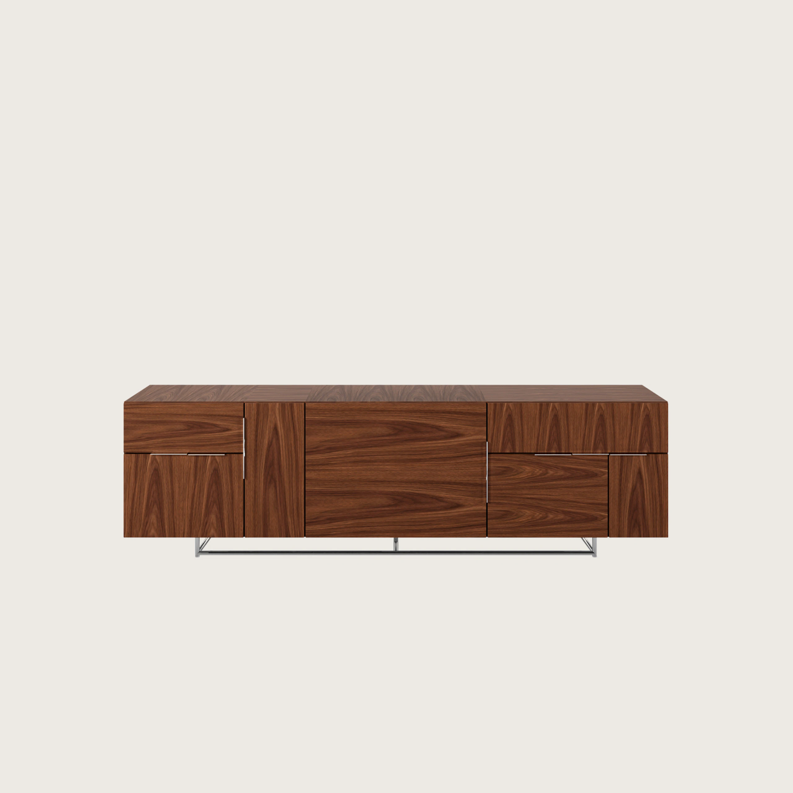 Three unit wide Domino Credenza with mixed storage in walnut with a polished aluminum base viewed from the front.