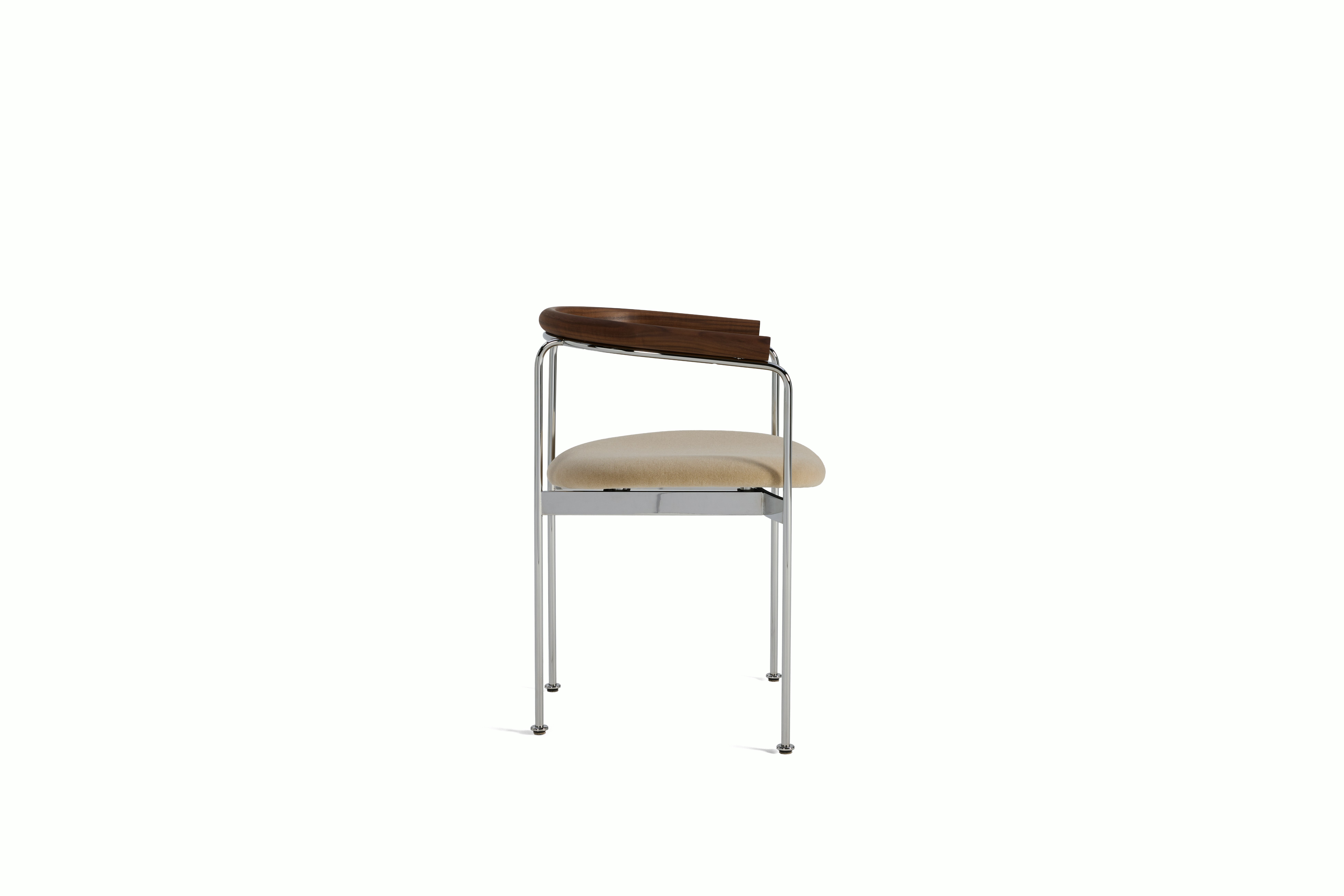 A Baia Dining Chair in Sand Walnut viewed from the side.