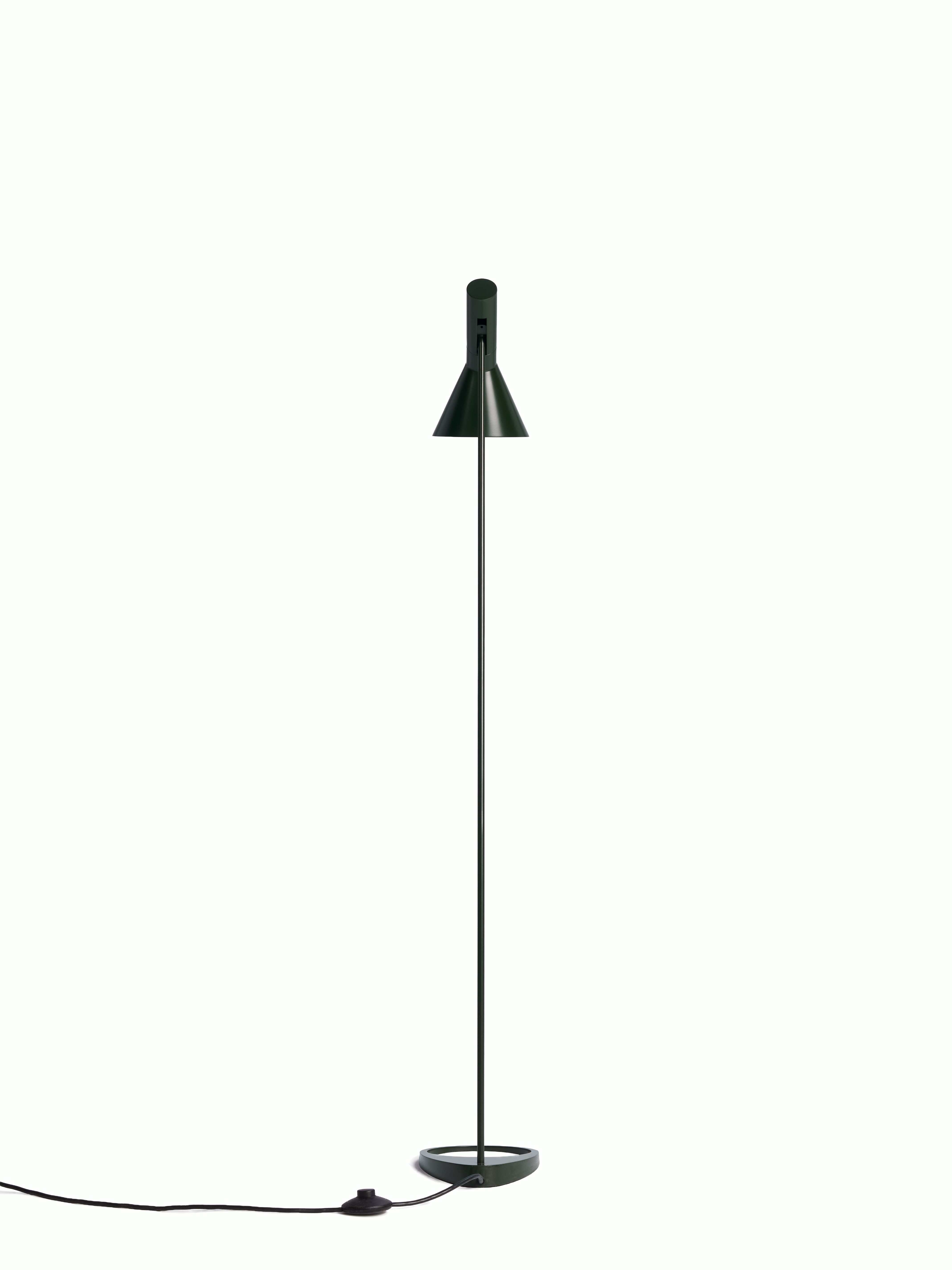 A AJ Floor Lamp in olive green viewed from behind.