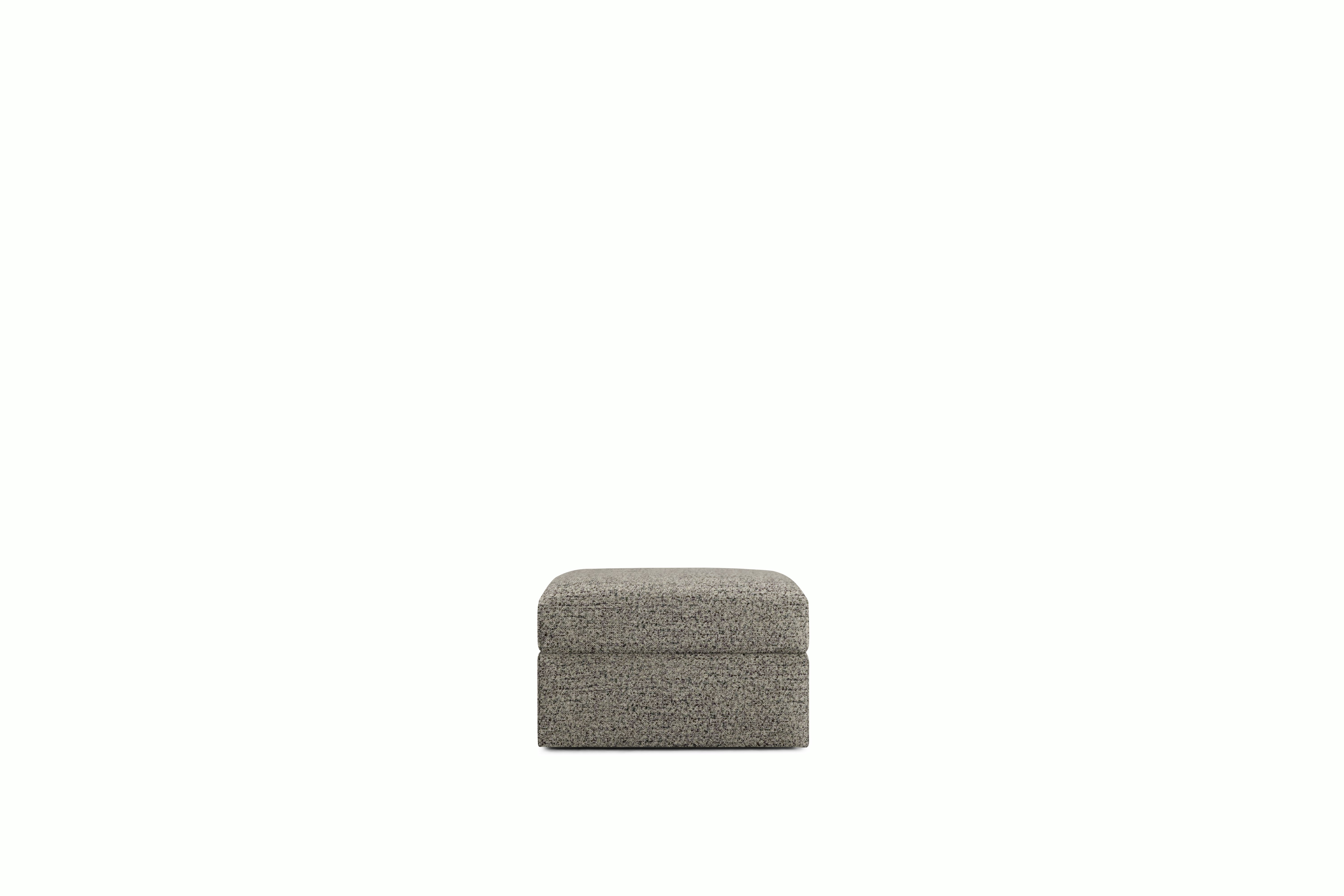 A Irvin Ottoman in Pepper Viewed from the front.