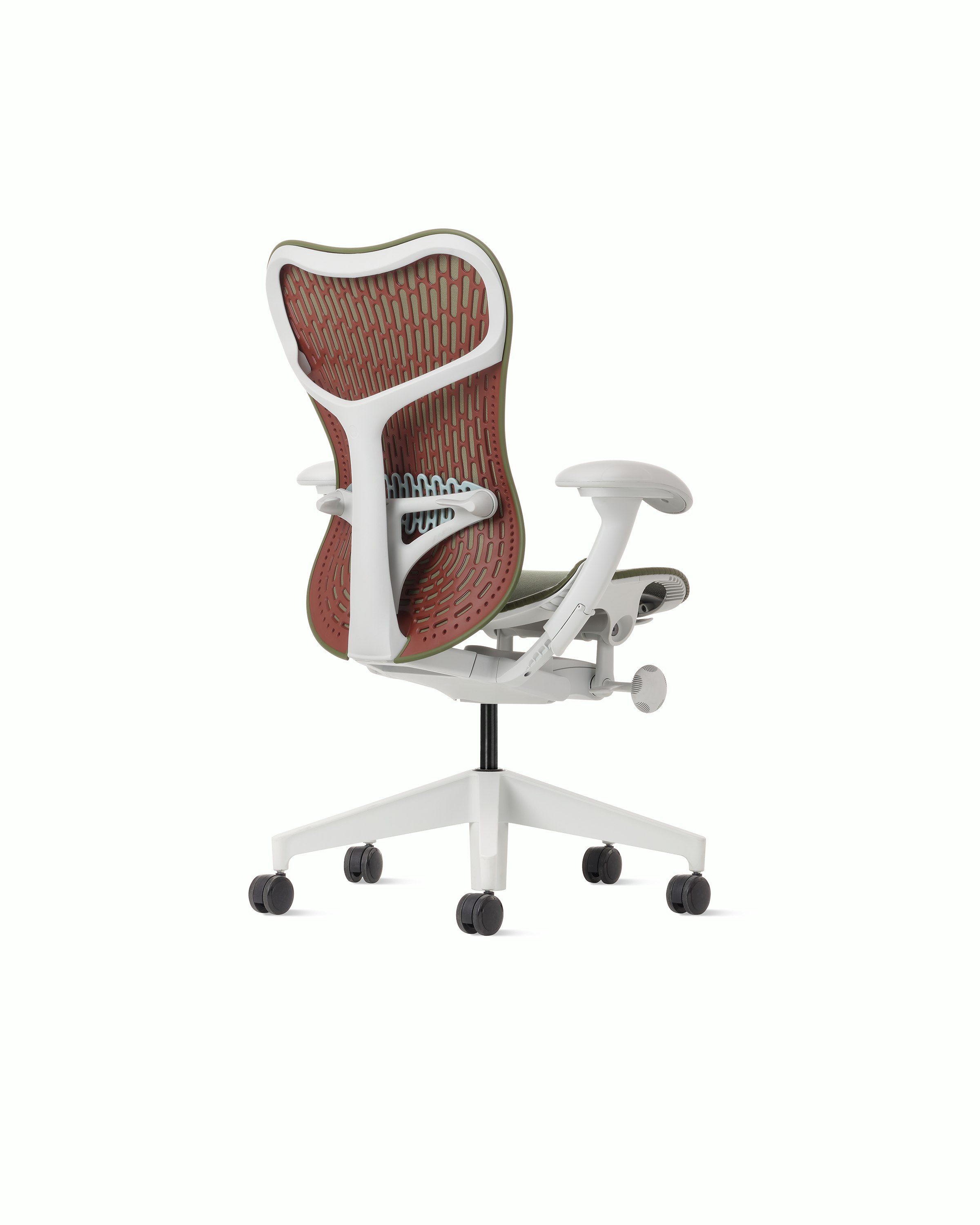 Rear angle view of a Mirra 2 chair with a Butterfly back in olive color-block and alpine frame.