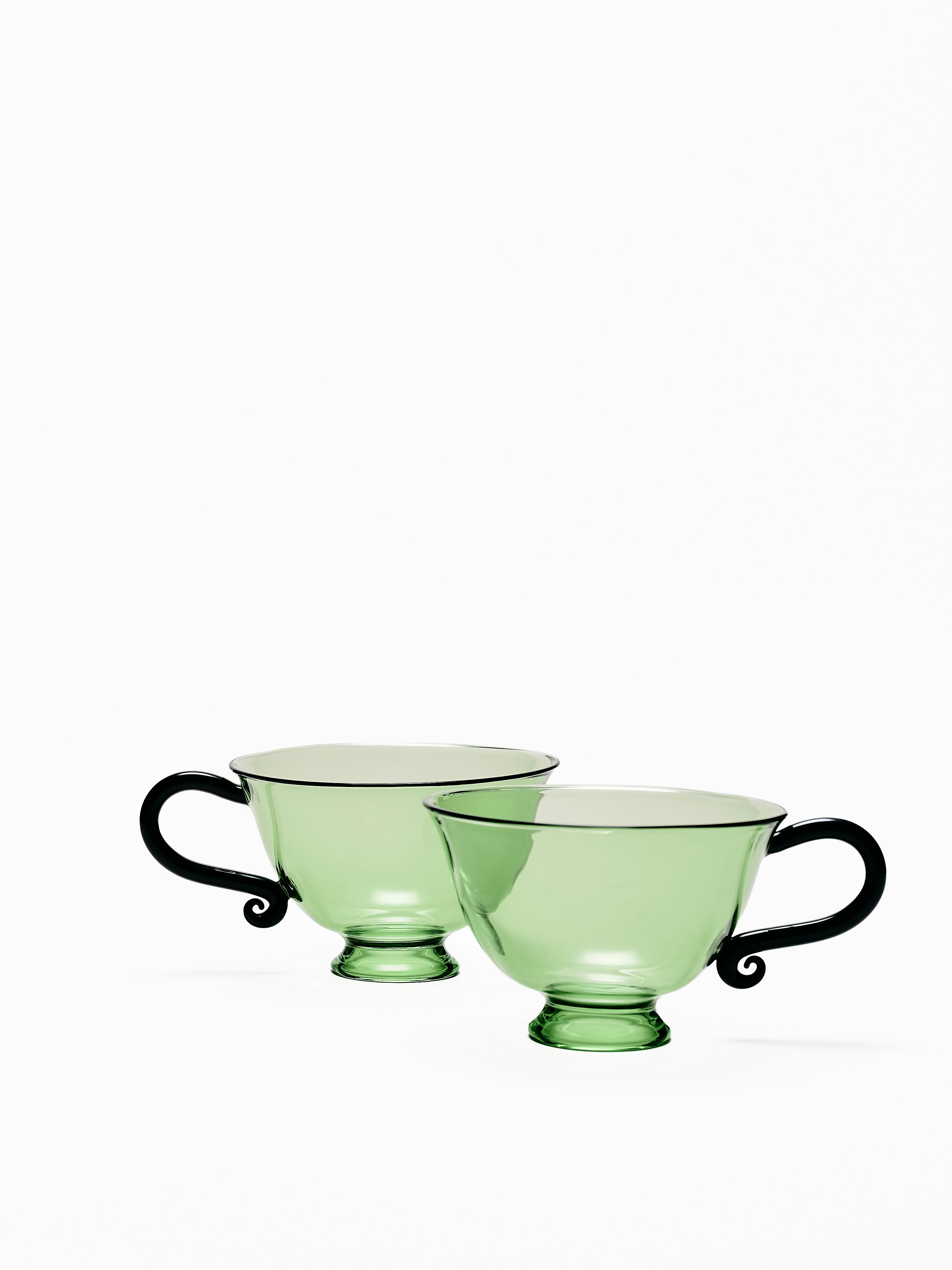 A Petite Tasse Cups in Green Black viewed from the front.