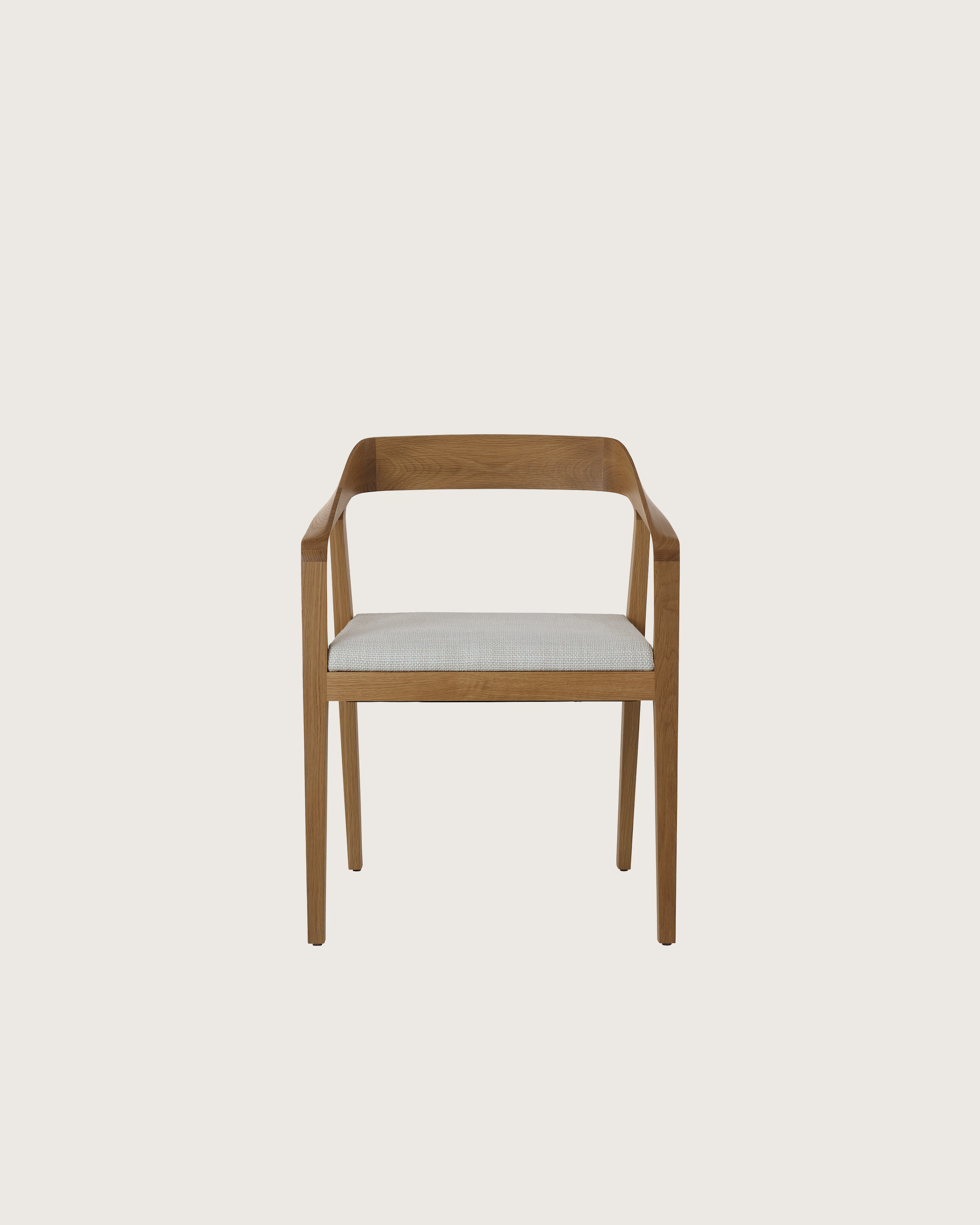 Full Twist Guest Chair by Mark Goetz for Geiger in Natural Oak with Capri in Show upholstery, front view on a white sweep.