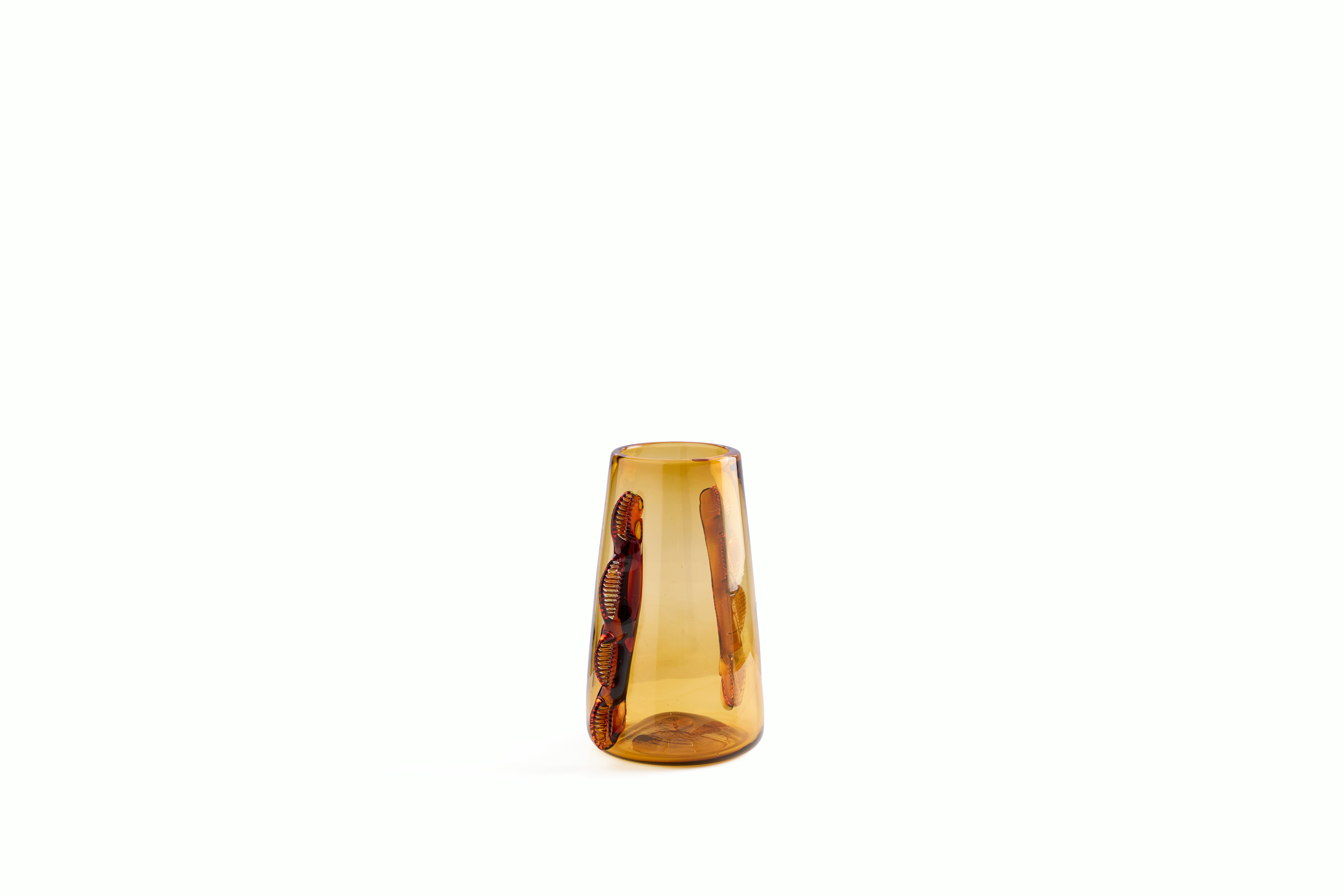 A Betta Vase in Amber viewed from an angle.