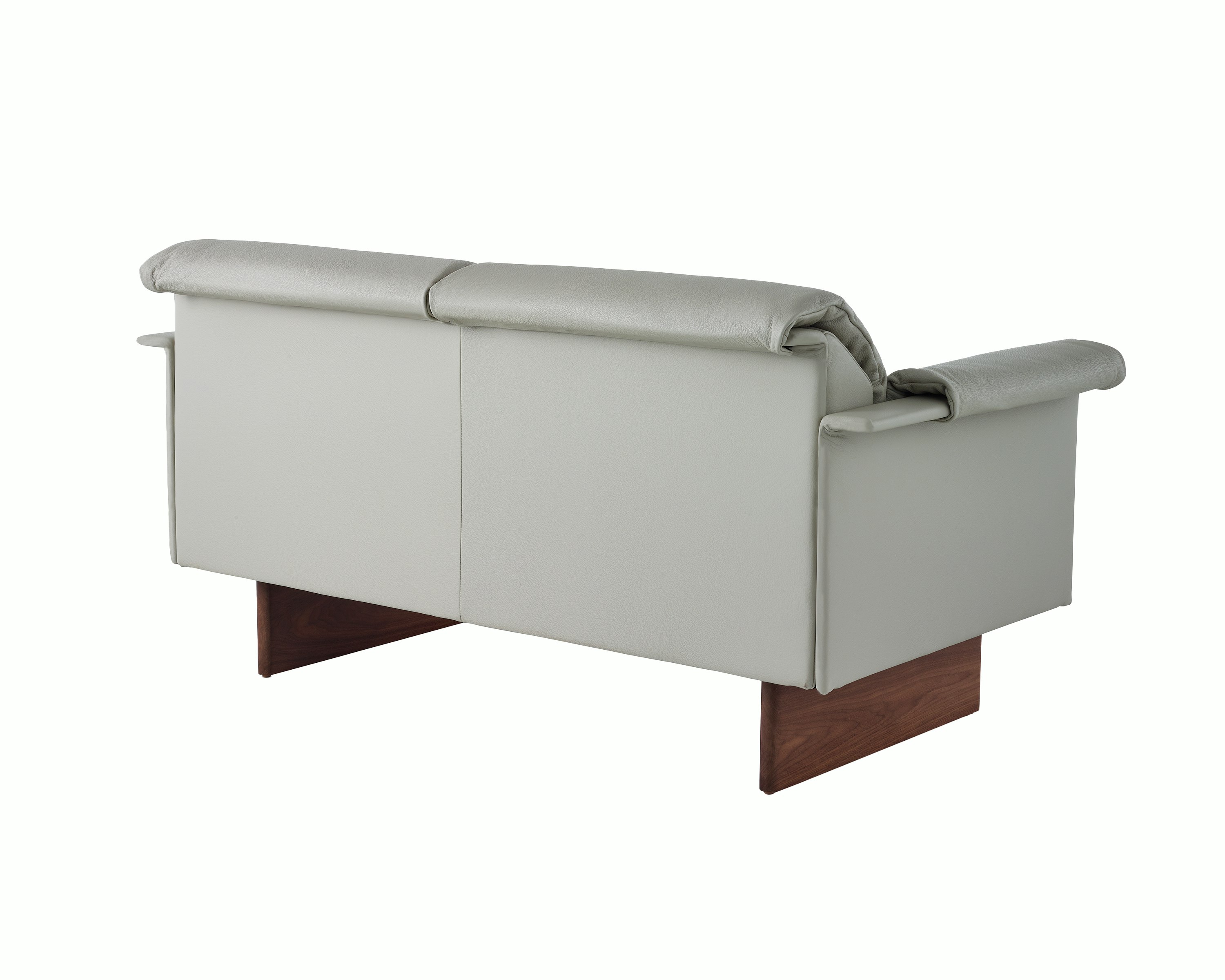 Mantle Two Seater Sofa in Bristol Leather Ash Grey with Wood Base, viewed at angle.