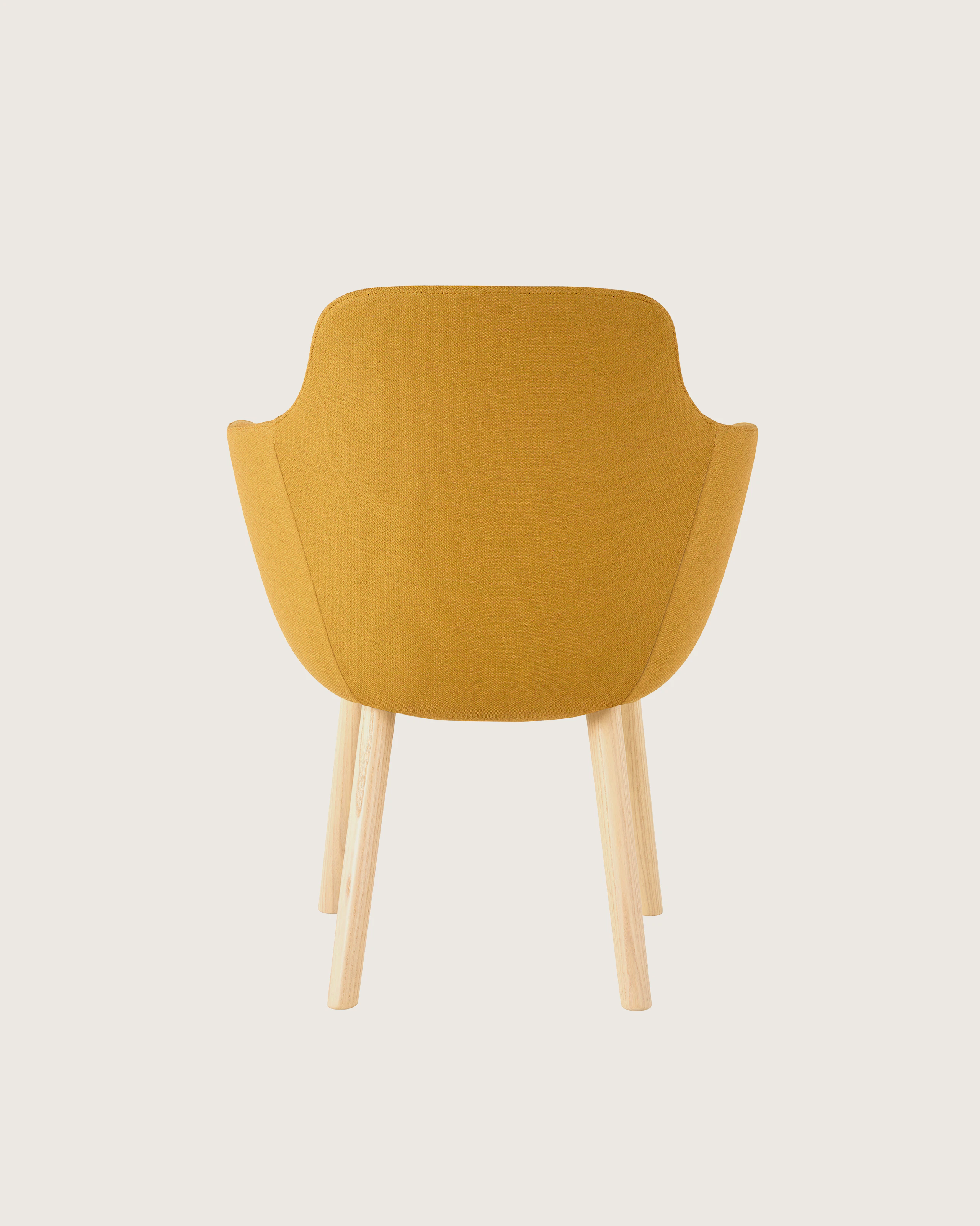 A Saiba Side Chair with yellow upholstery and light wood legs, viewed from the back.