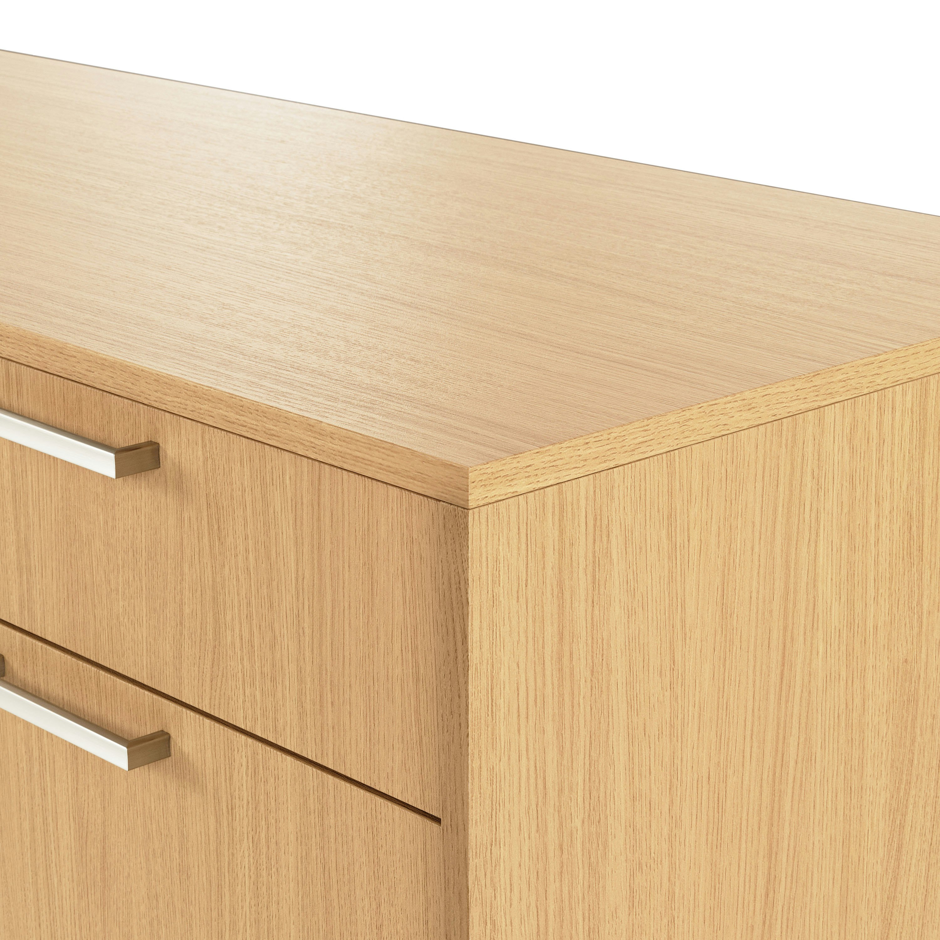 Detail shot of the edge of a JD Credenza with one box drawer over a fridge drawer in Natural Rift Cut Oak with Satin Nickel drawer pulls.