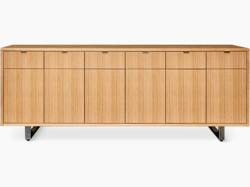 Highline 25 Credenza in Rift Cut European White Oak with Polished Chrome base and pulls, front view.