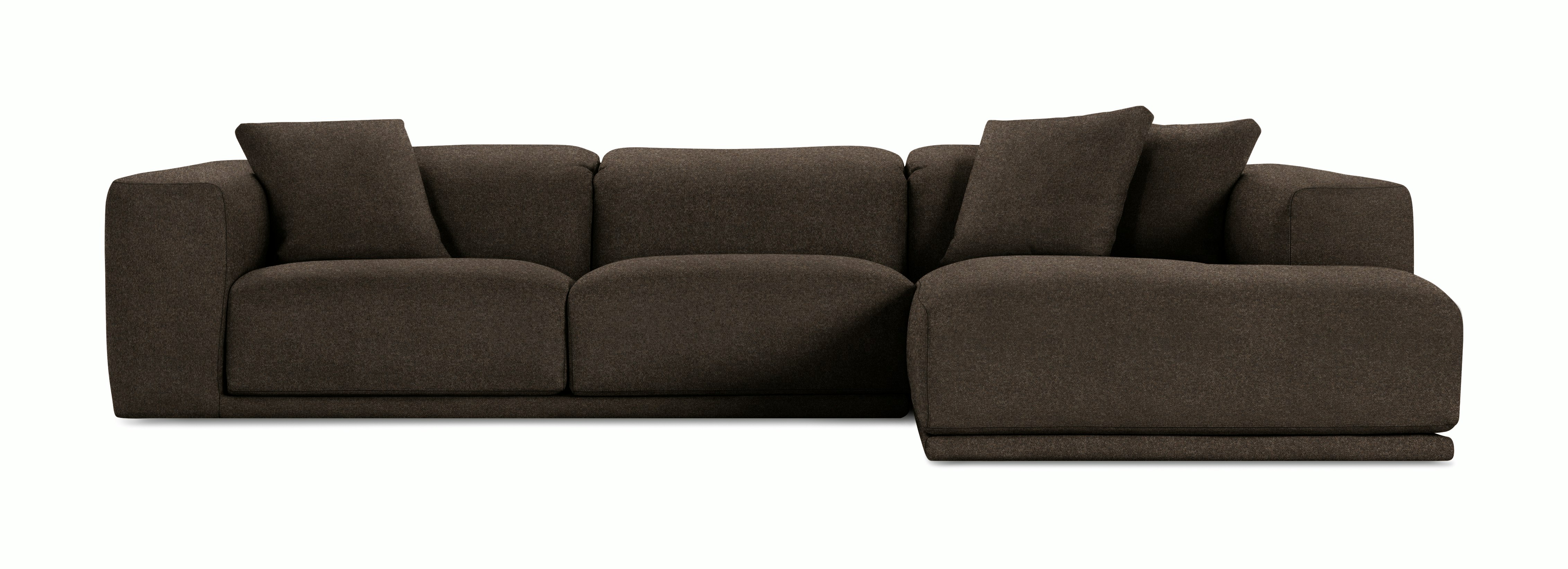 A Kelston Sectional in Chocolate viewed from the front.