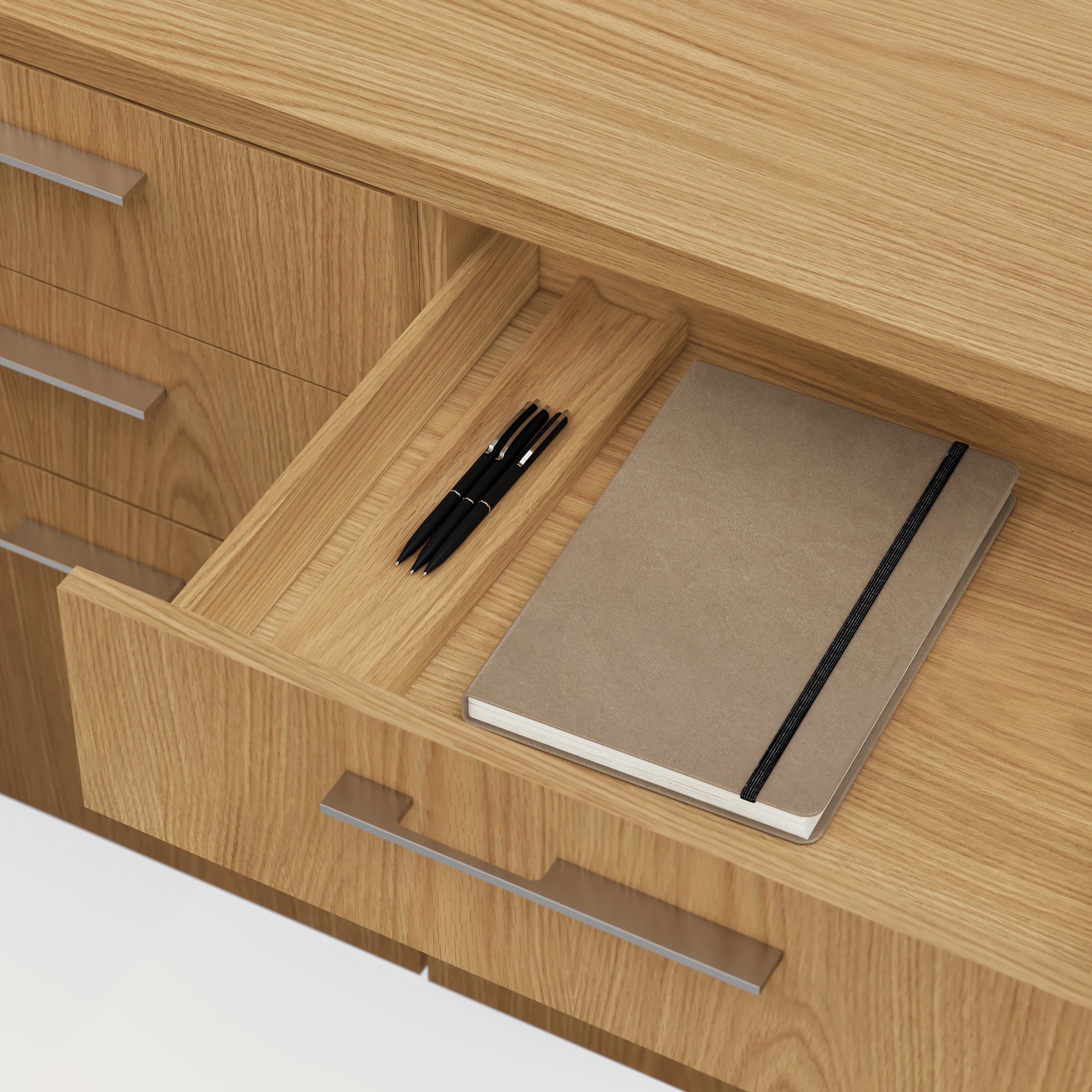 Detail shot of the Geiger One Casegoods drawer interior in Natural Flat Cut Oak viewed from an angle.