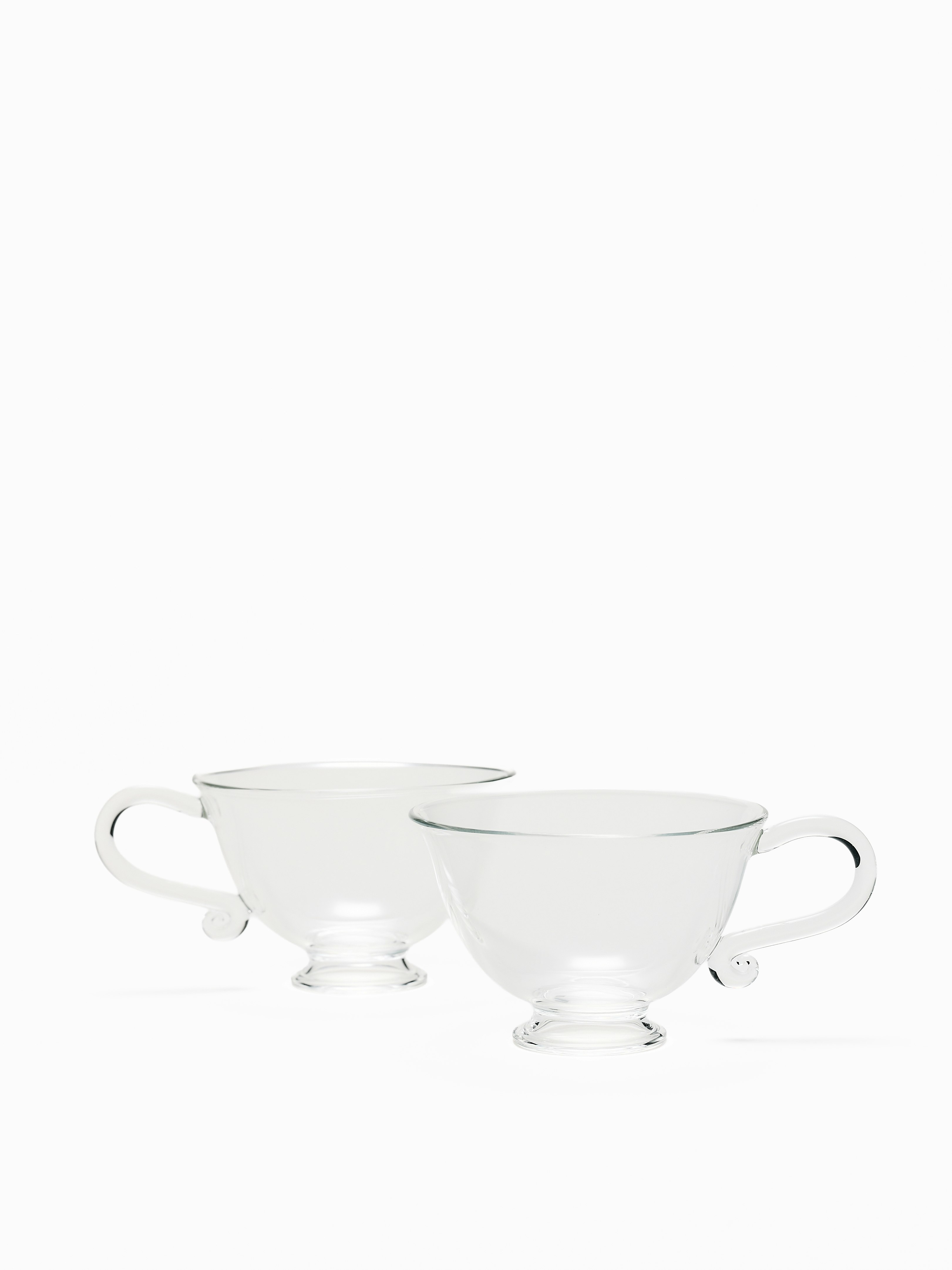 A Petite Tasse Cups in Clear viewed from the front.