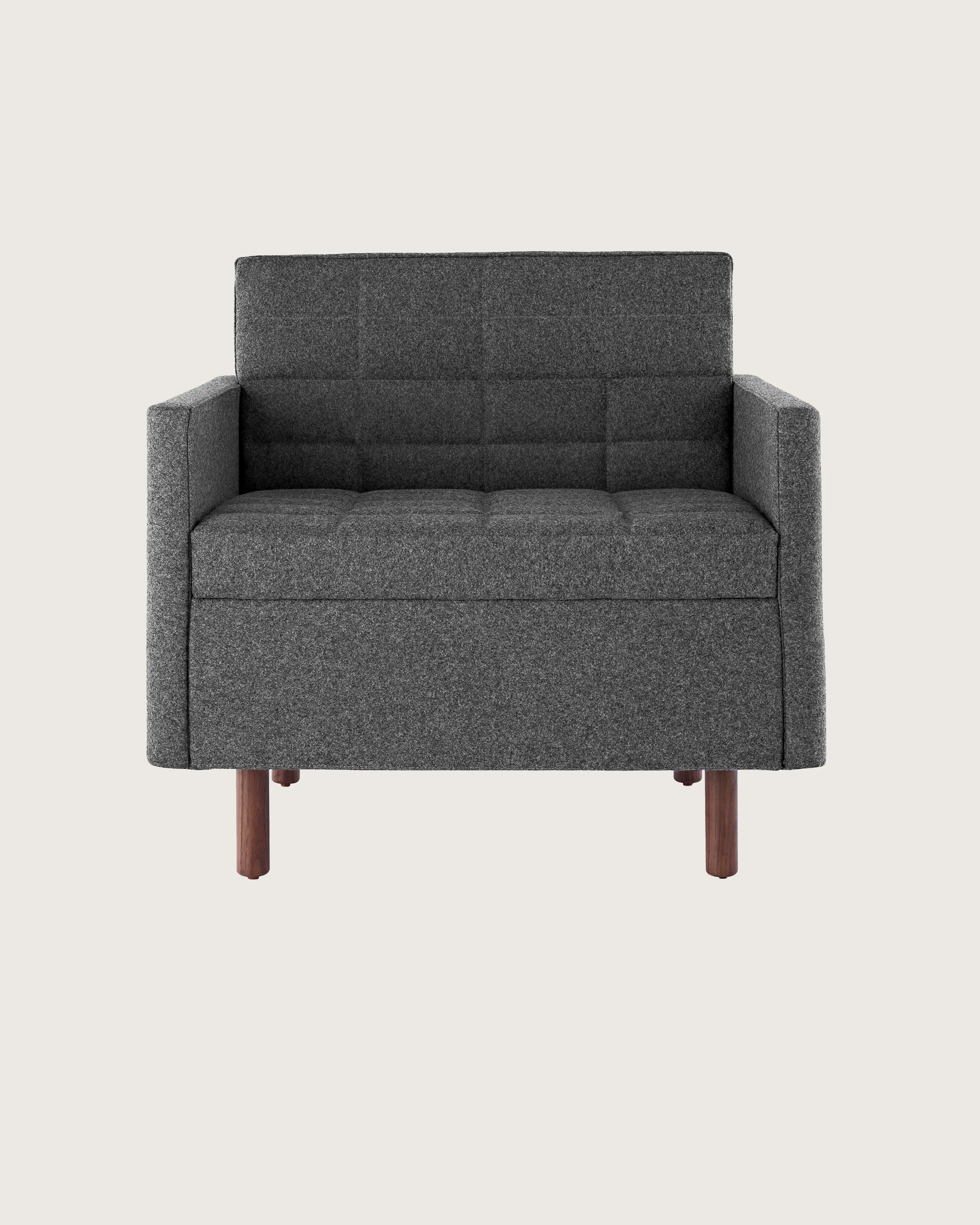 A quilted Tuxedo Classic club chair upholstered in dark gray fabric, viewed from the front.