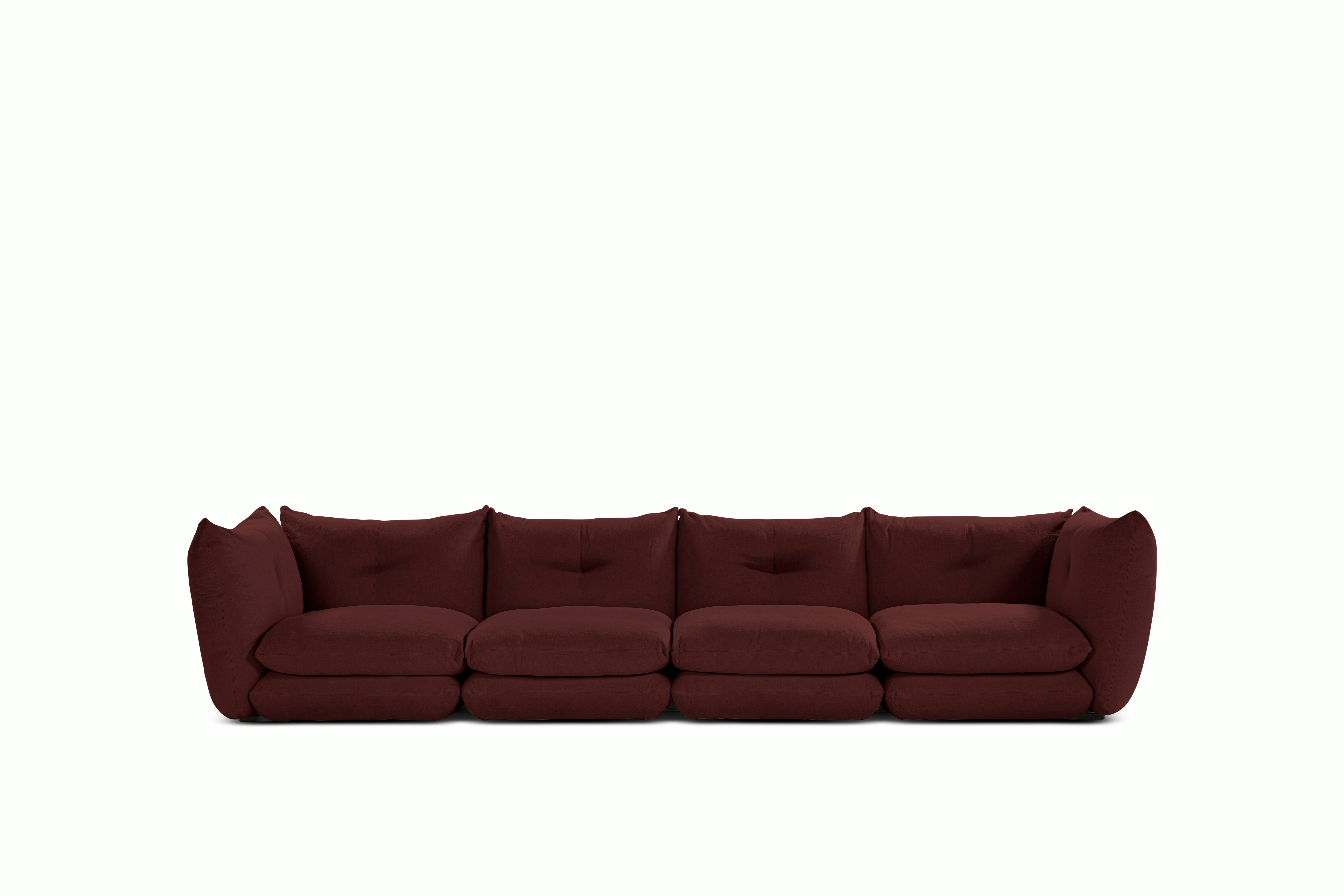 A Perron Pillo Sofa in Garnet viewed from the front.