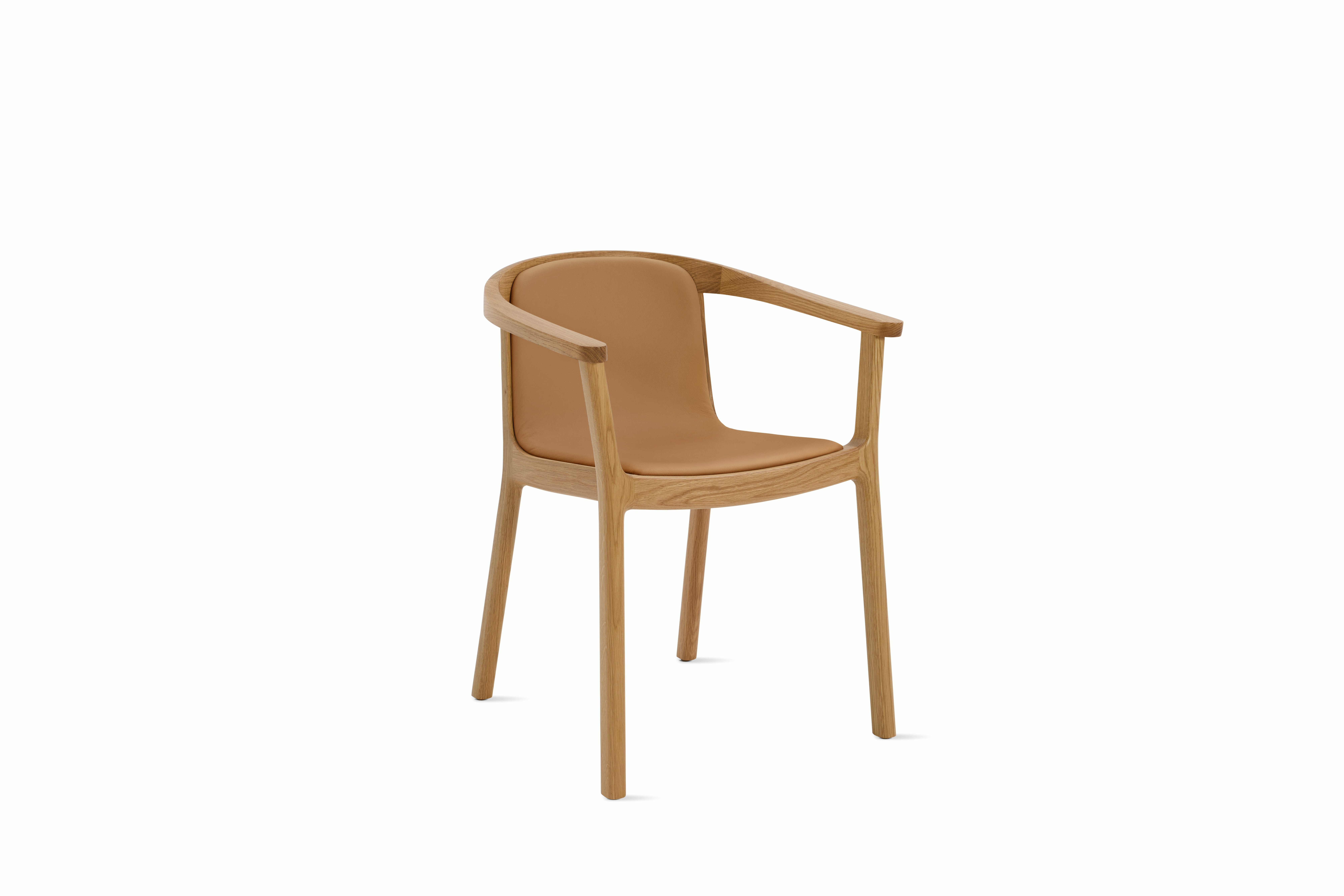 A Lijn Armchair in Shore Oak viewed from an angle.