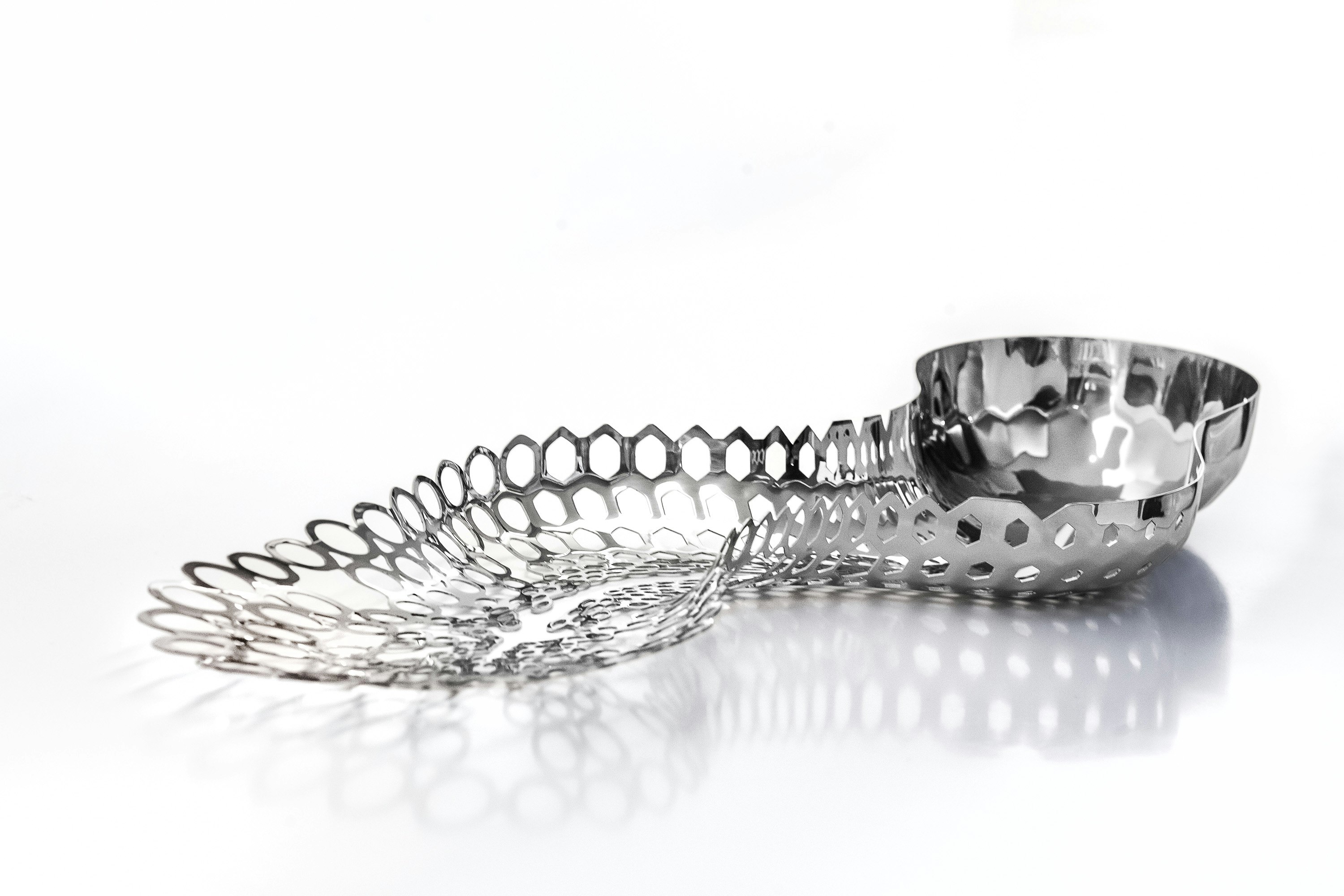 A detailed look at Cell Centerpiece in Stainless Steel.