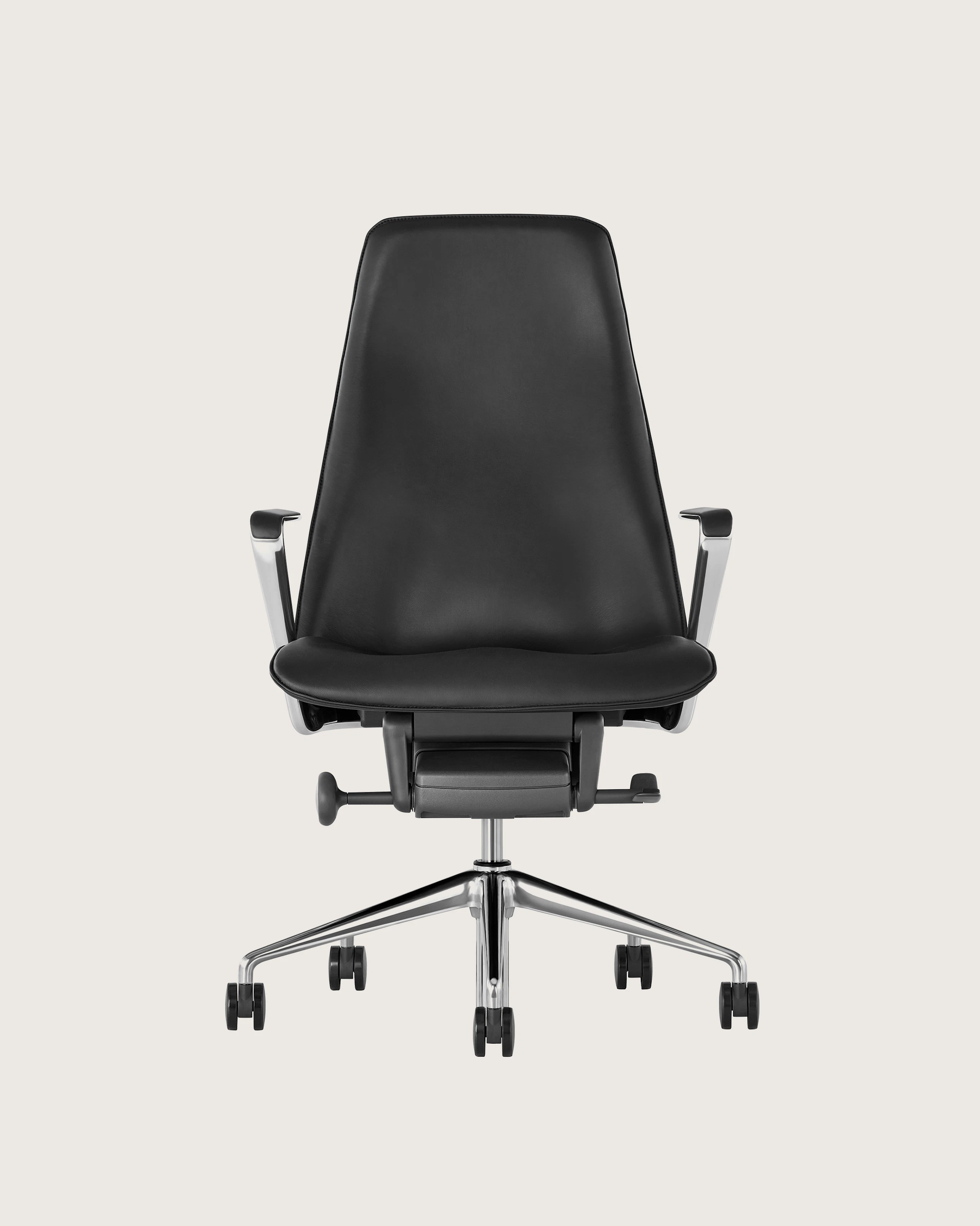 A Taper office chair with black leather upholstery, viewed from the front.