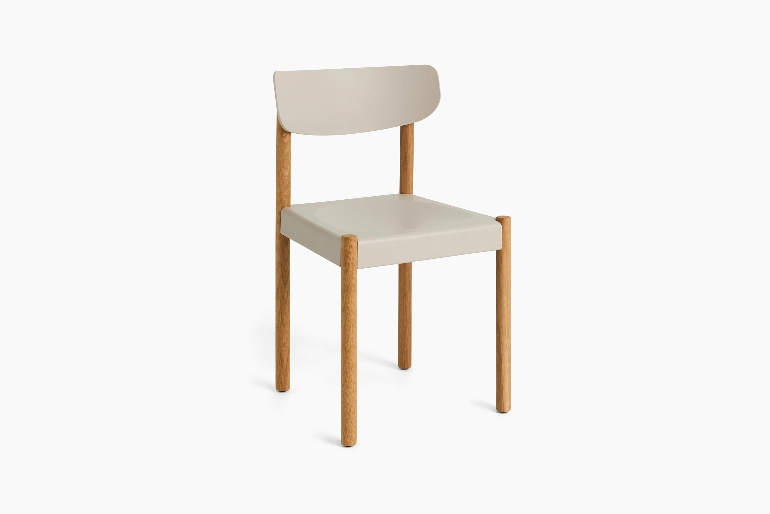 Pack Side Chair with blue seat and back on oak legs, angled view