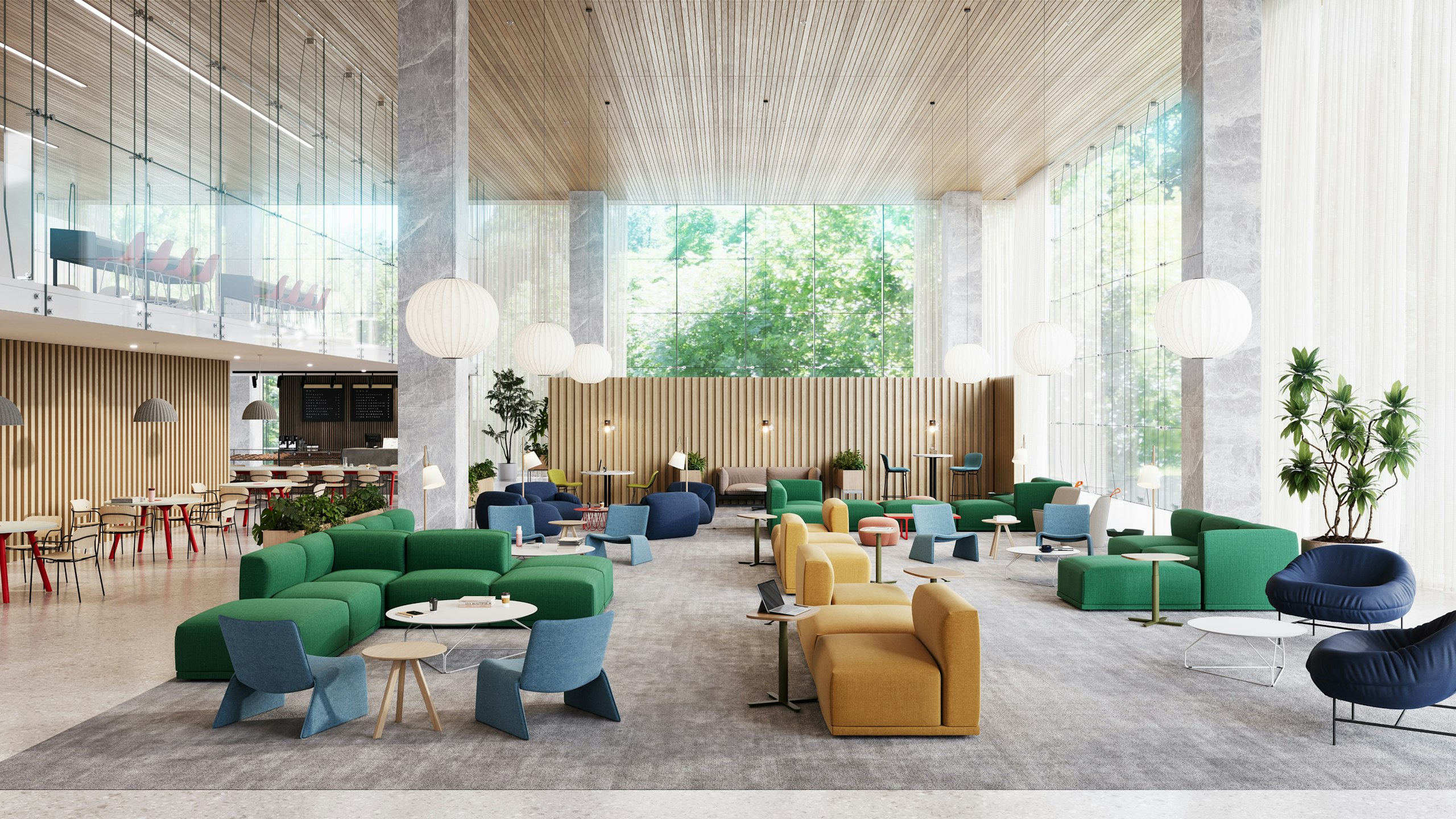 Student lounge furnished with HAY Copenhague tables, furnished with green Muuto Connect Modular sofas, and Herman Miller Passport tables.