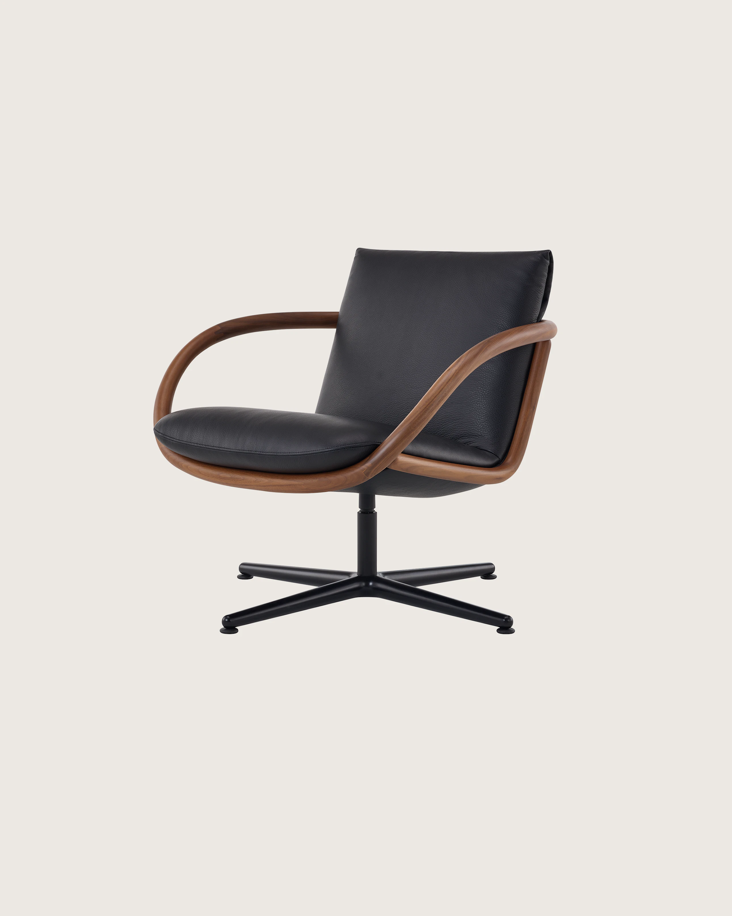 Full Loop Lounge Chair in Walnut and Black Leather with black base.