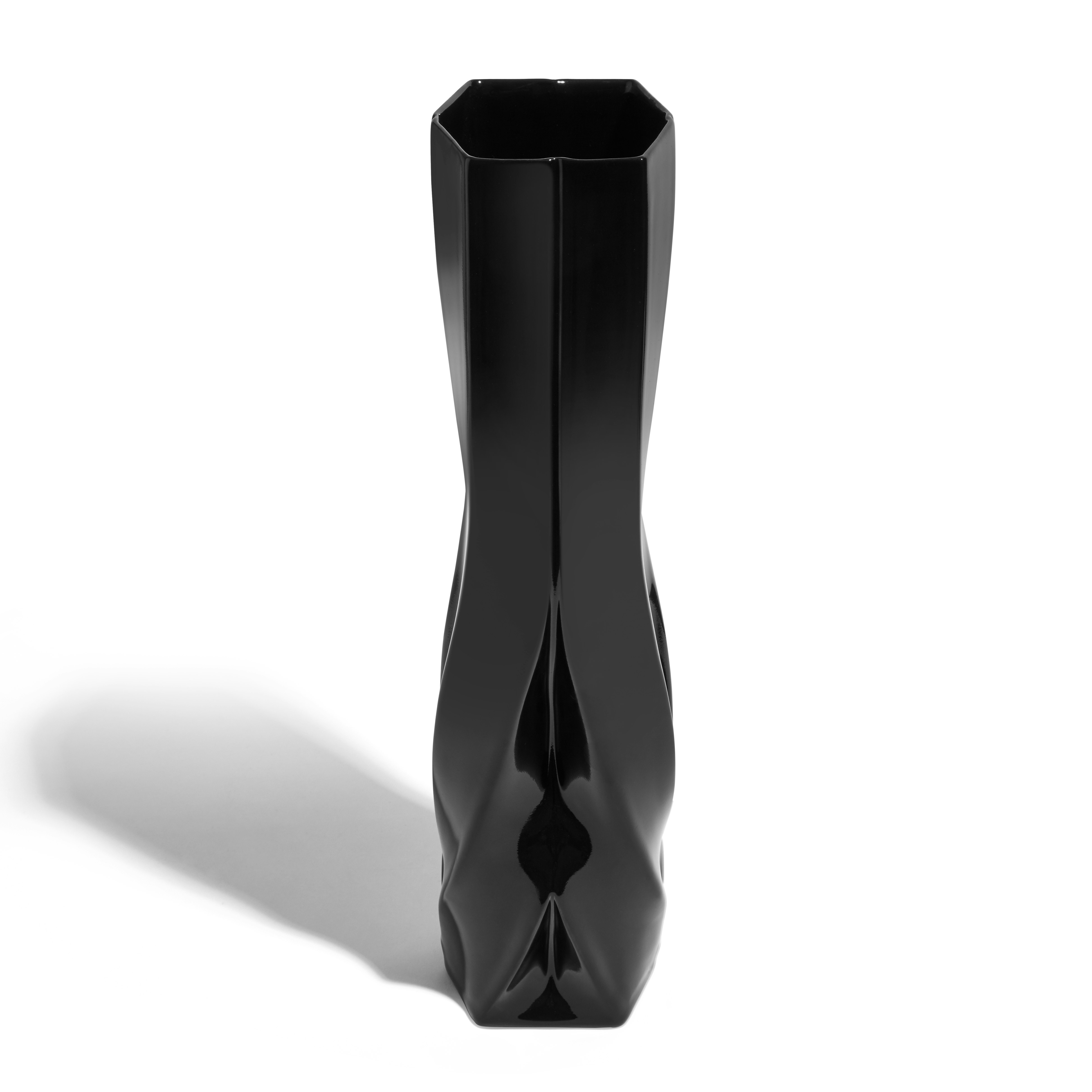 A Braid Vase in Tall, Black viewed from back.