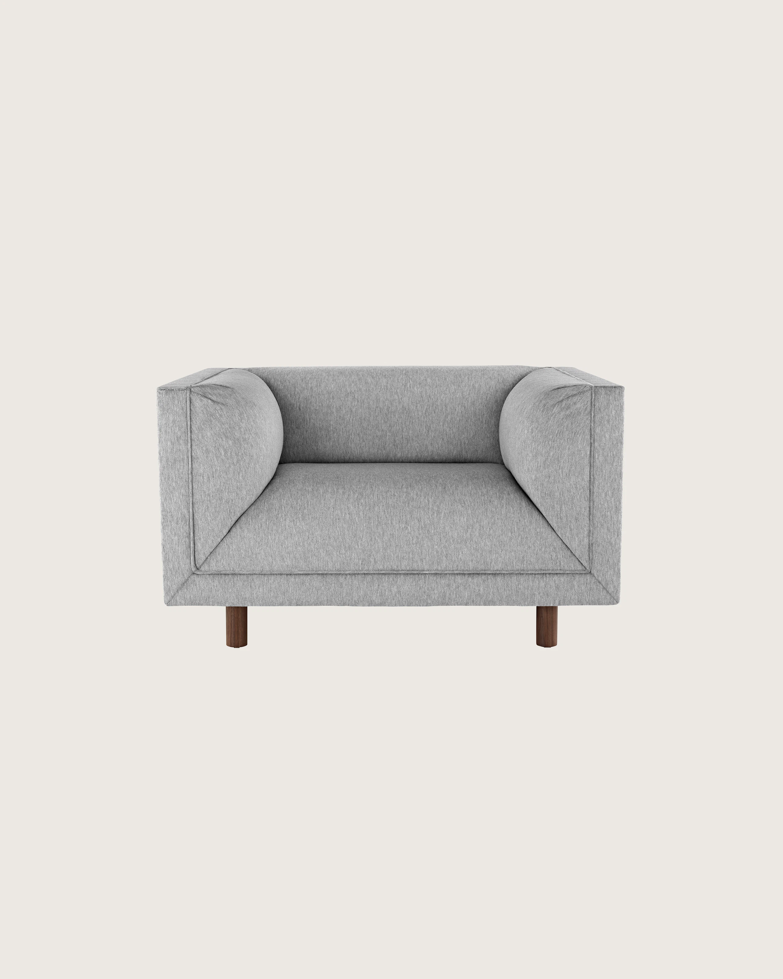 A light gray club chair from the Rolled Arm Sofa Group, viewed from the front.