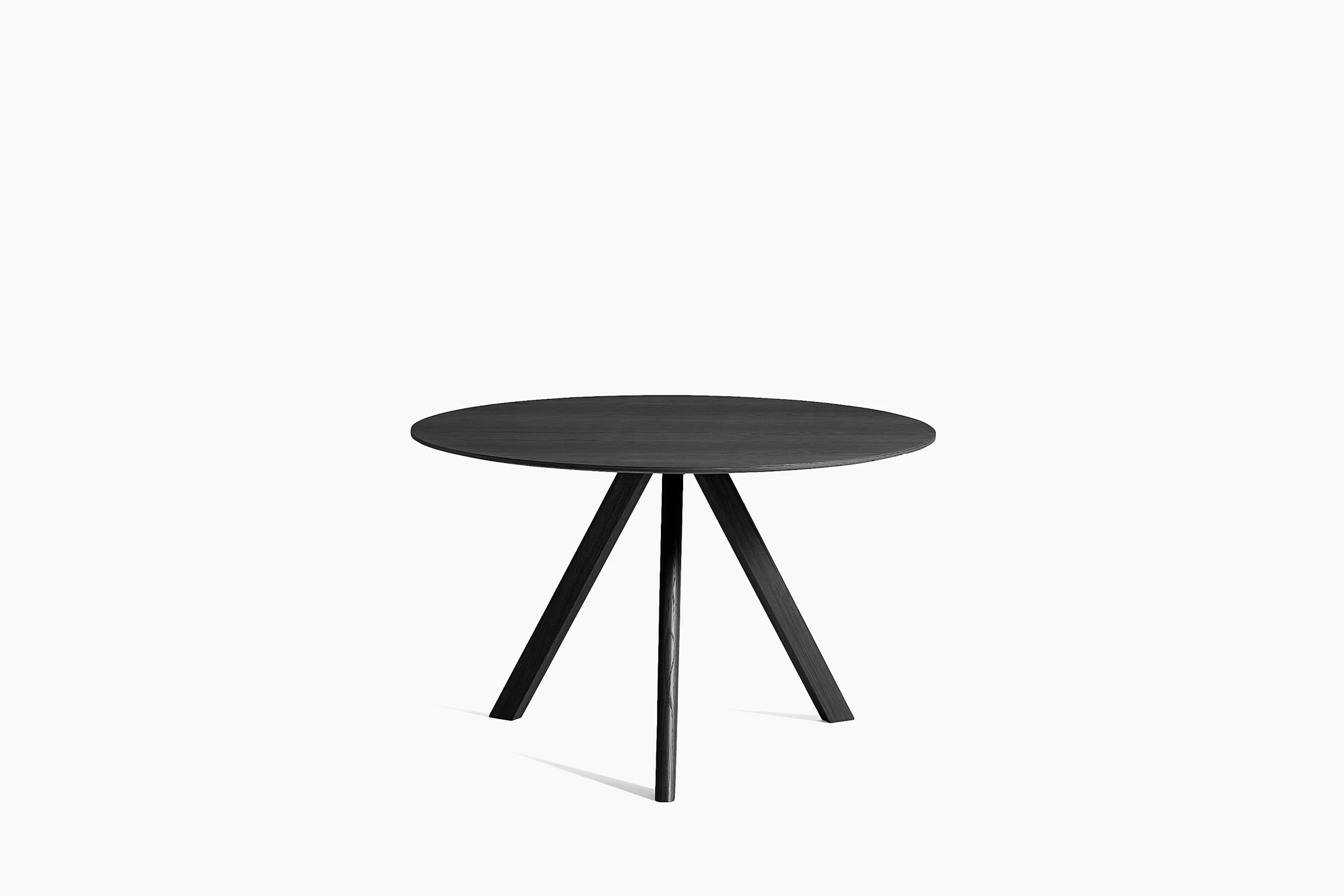Front view of a round Copenhague Dining Table in black.